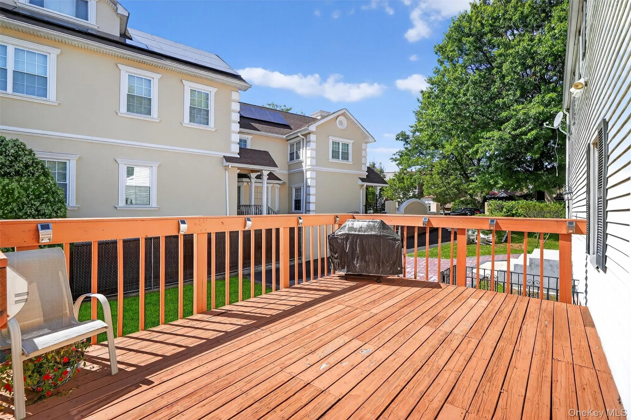 Wooden terrace with a yard Wooden terrace with a yard