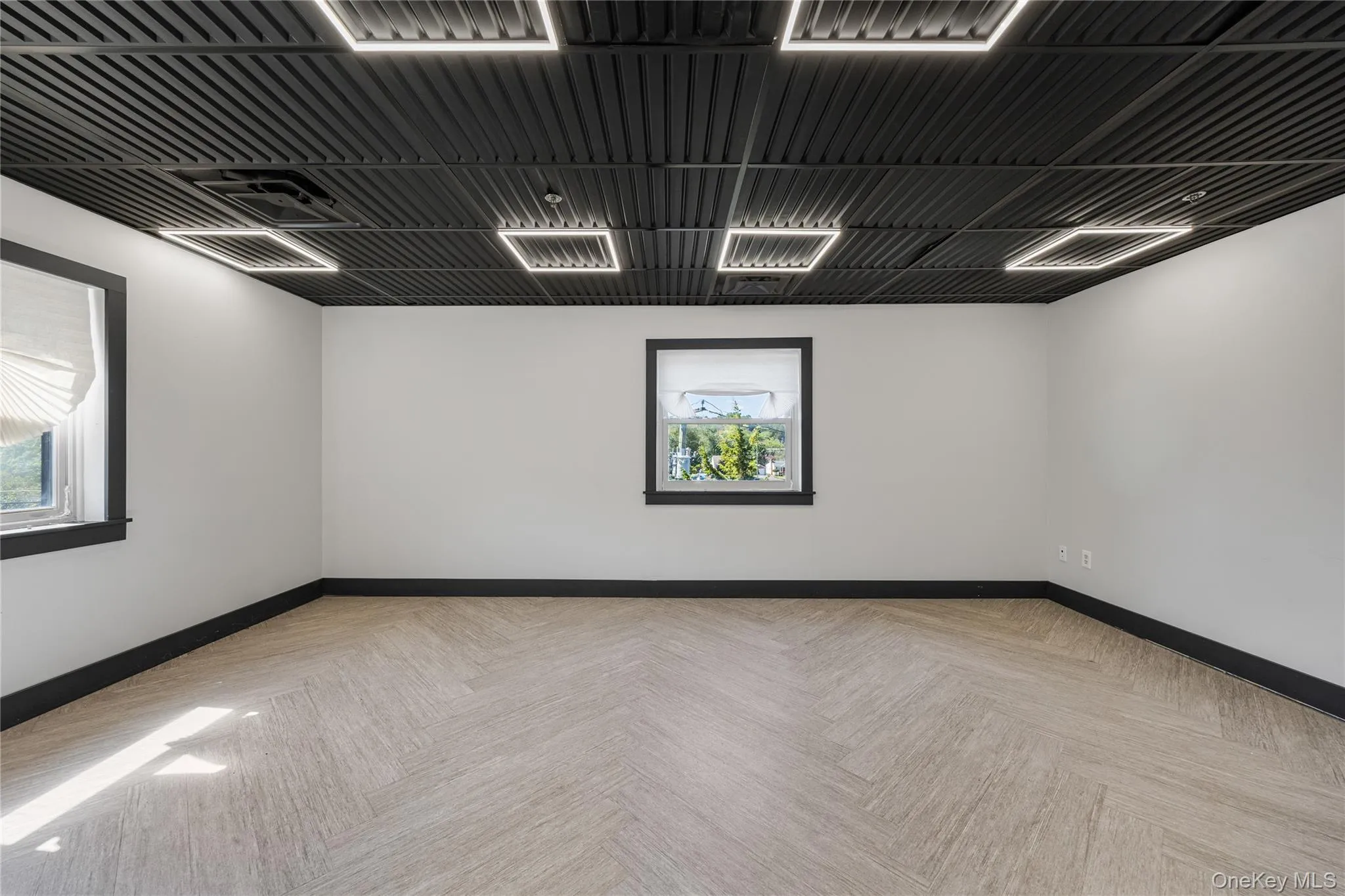 Empty room featuring baseboards Empty room featuring baseboards