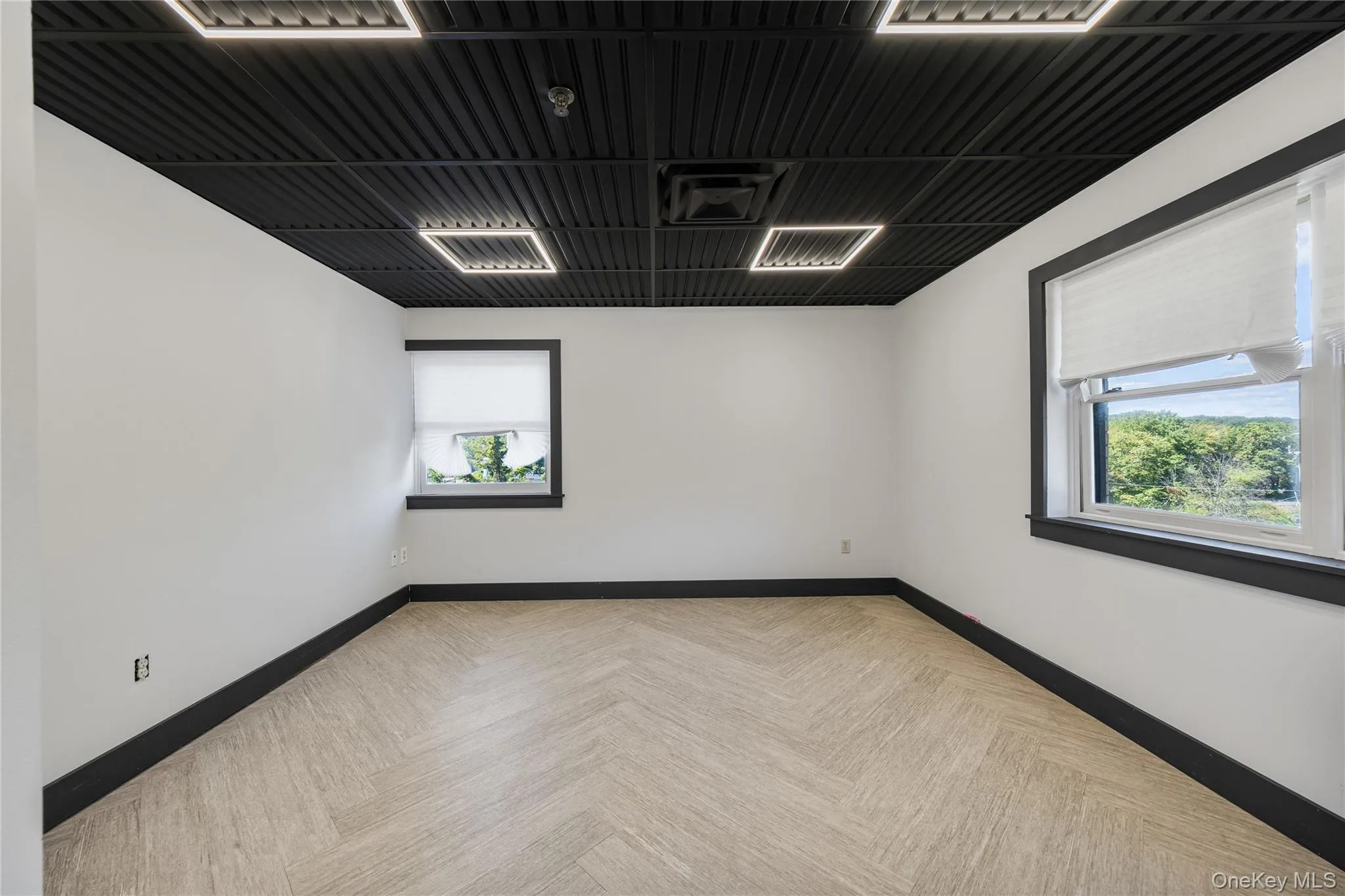 Empty room featuring baseboards Empty room featuring baseboards