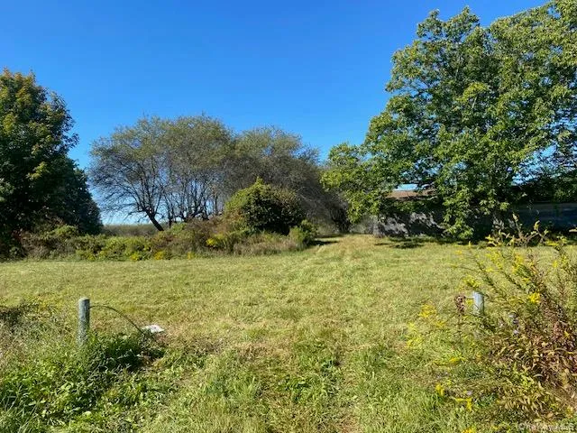 View of green lawn with a view of rural / pastoral area View of green lawn with a view of rural / pastoral area