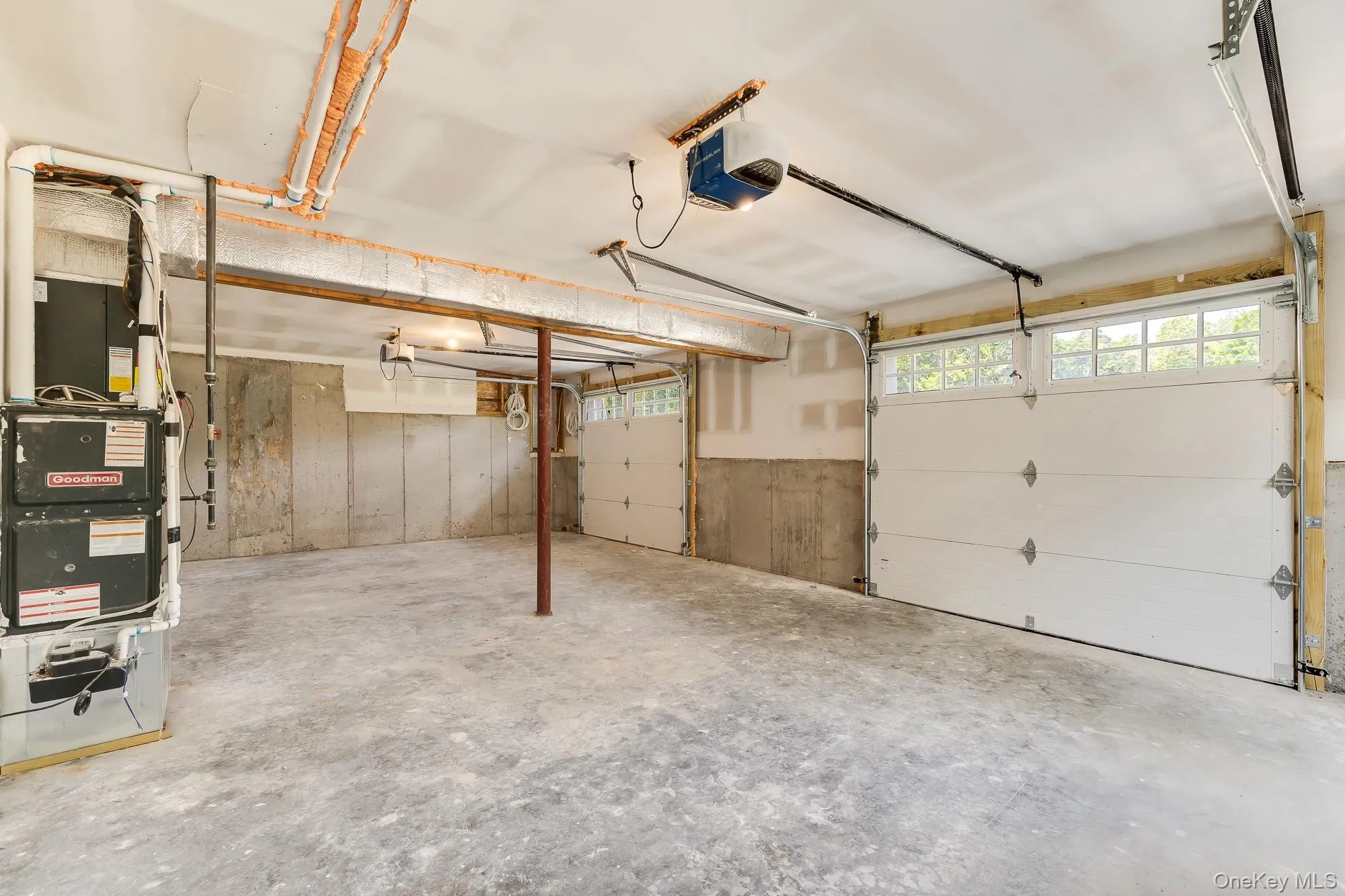 Garage with a garage door opener Garage with a garage door opener