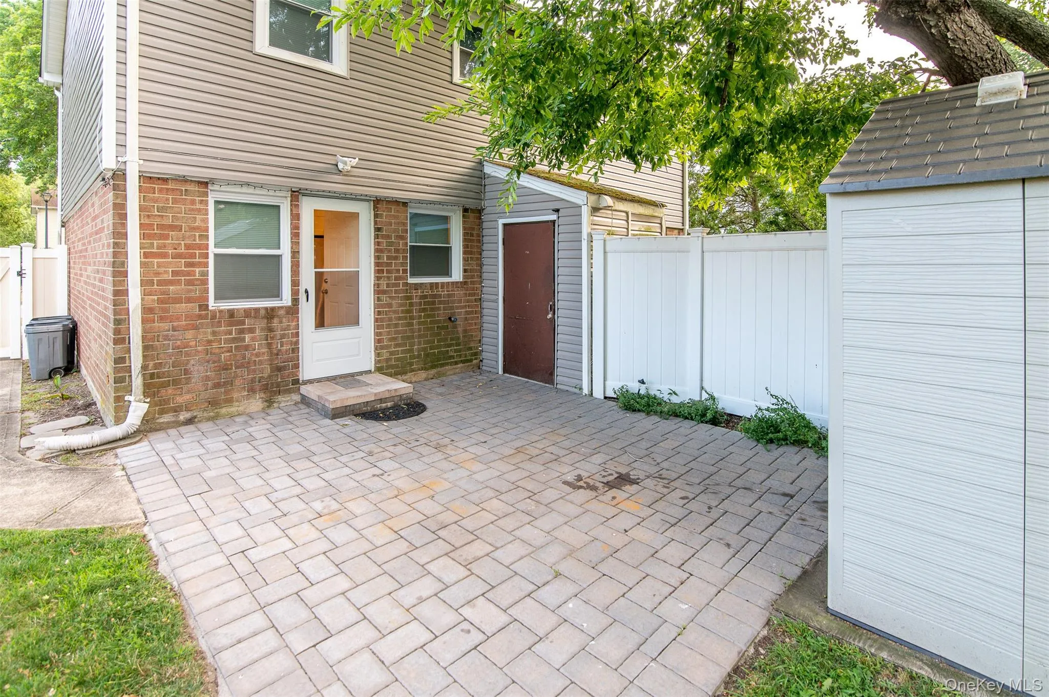 View of patio / terrace featuring an outbuilding View of patio / terrace featuring an outbuilding