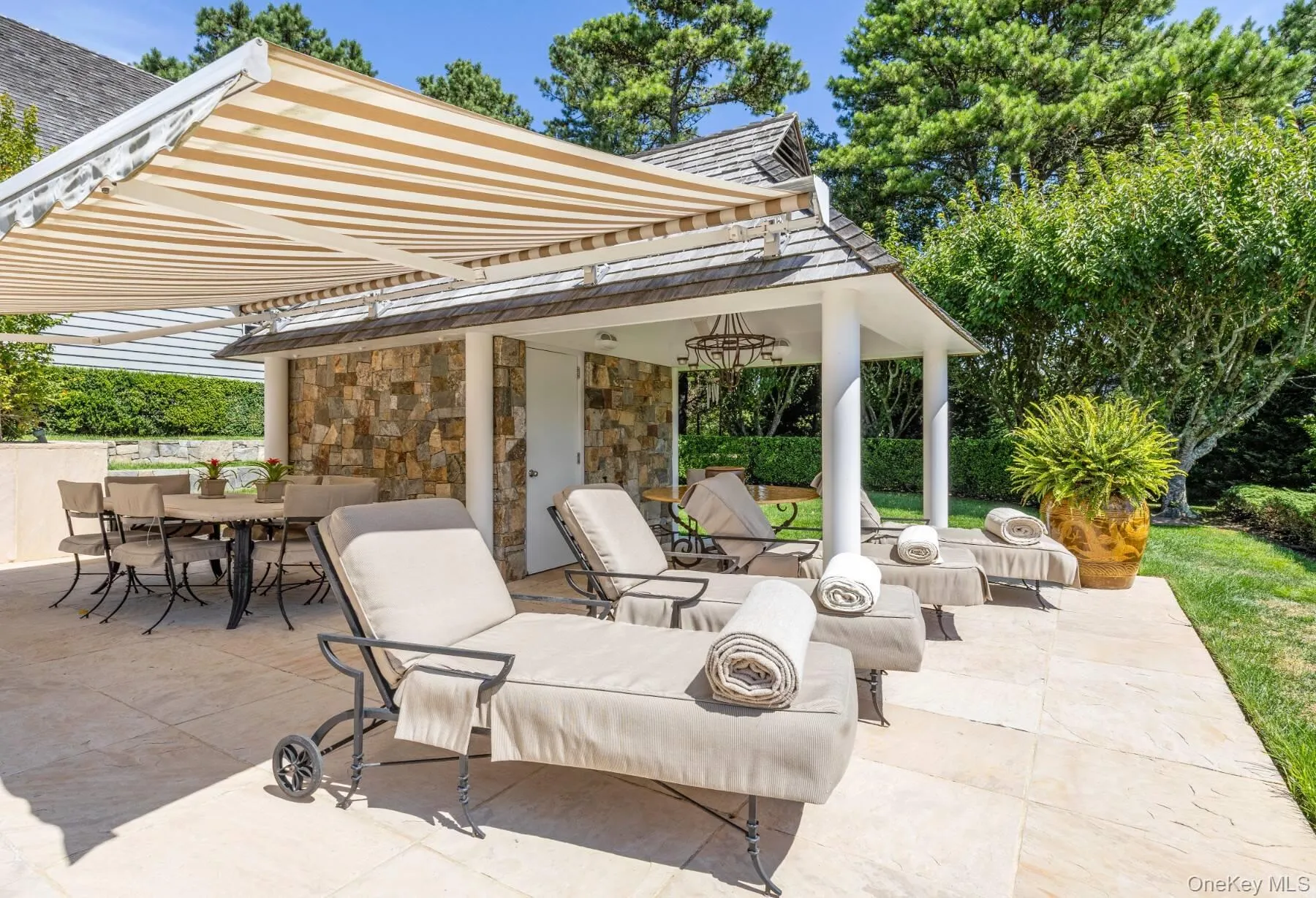View of patio / terrace featuring outdoor dining area and an outdoor living space View of patio / terrace featuring outdoor dining area and an outdoor living space