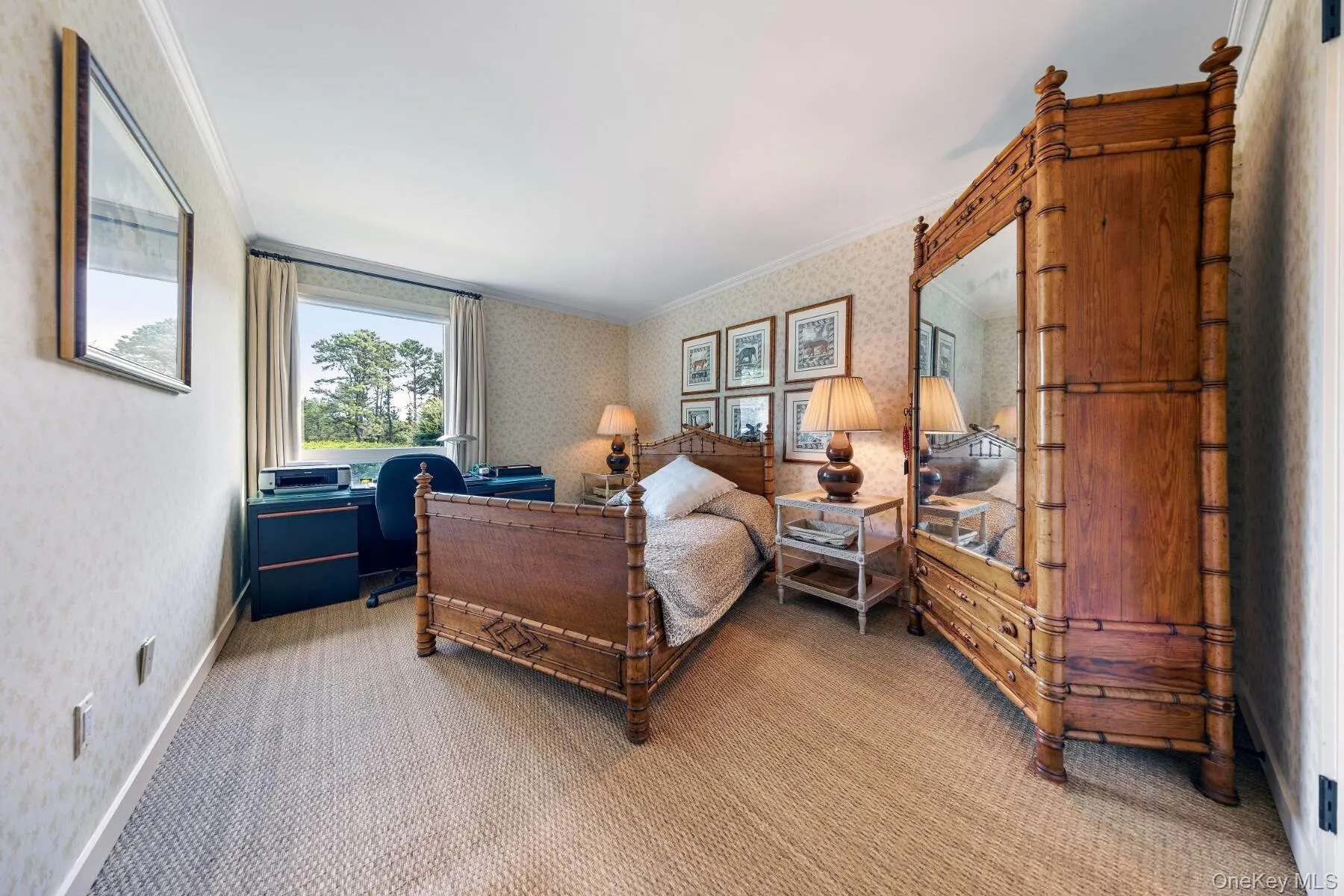 Carpeted bedroom with crown molding and wallpapered walls Carpeted bedroom with crown molding and wallpapered walls