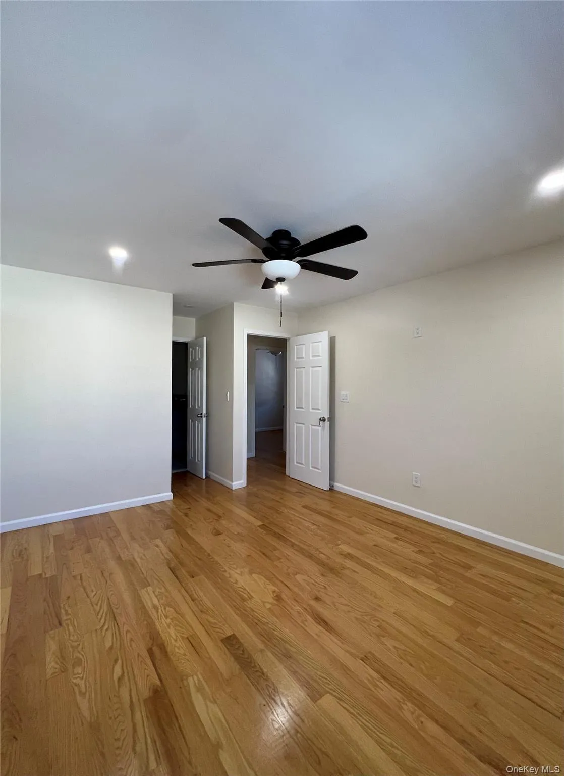 Unfurnished bedroom with light wood-style flooring, recessed lighting, and ceiling fan Unfurnished bedroom with light wood-style flooring, recessed lighting, and ceiling fan
