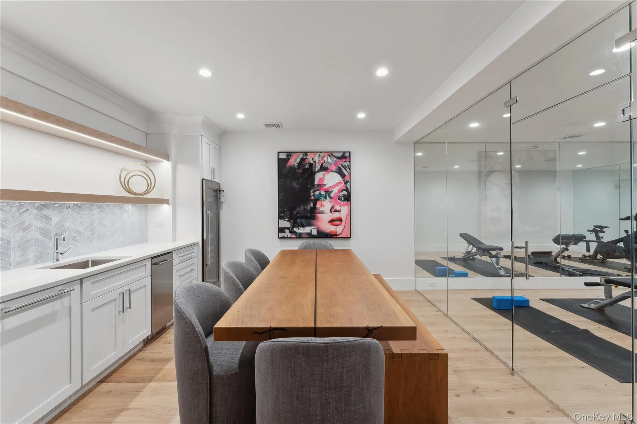 Dining room featuring recessed lighting and light wood-type flooring Dining room featuring recessed lighting and light wood-type flooring