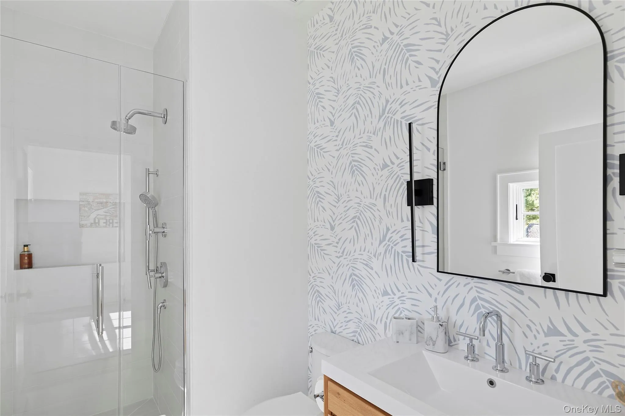 Full bathroom with a stall shower and vanity Full bathroom with a stall shower and vanity