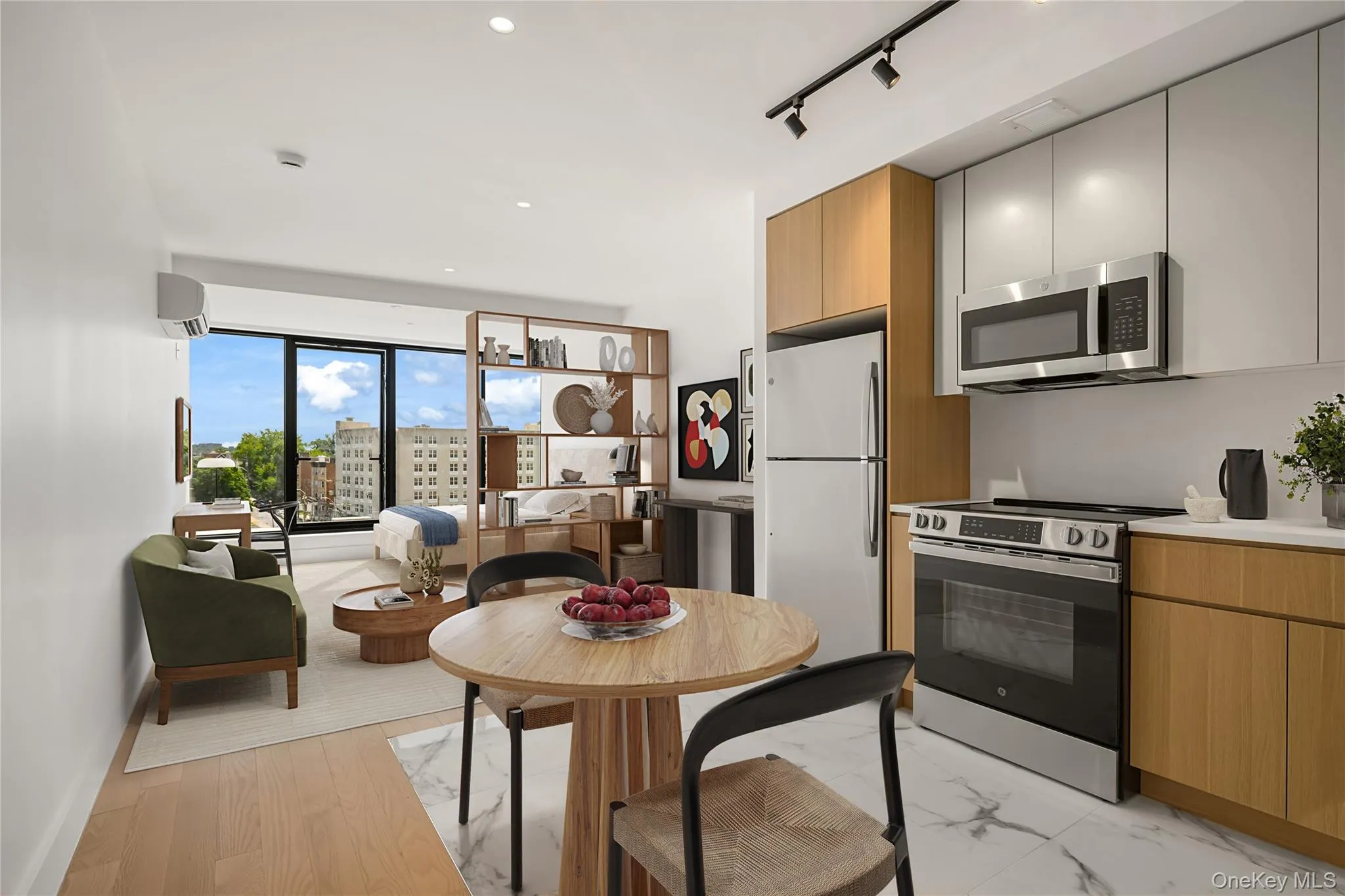 Kitchen with appliances with stainless steel finishes, modern cabinets, track lighting, brown cabinetry, and recessed lighting Kitchen with appliances with stainless steel finishes, modern cabinets, track lighting, brown cabinetry, and recessed lighting