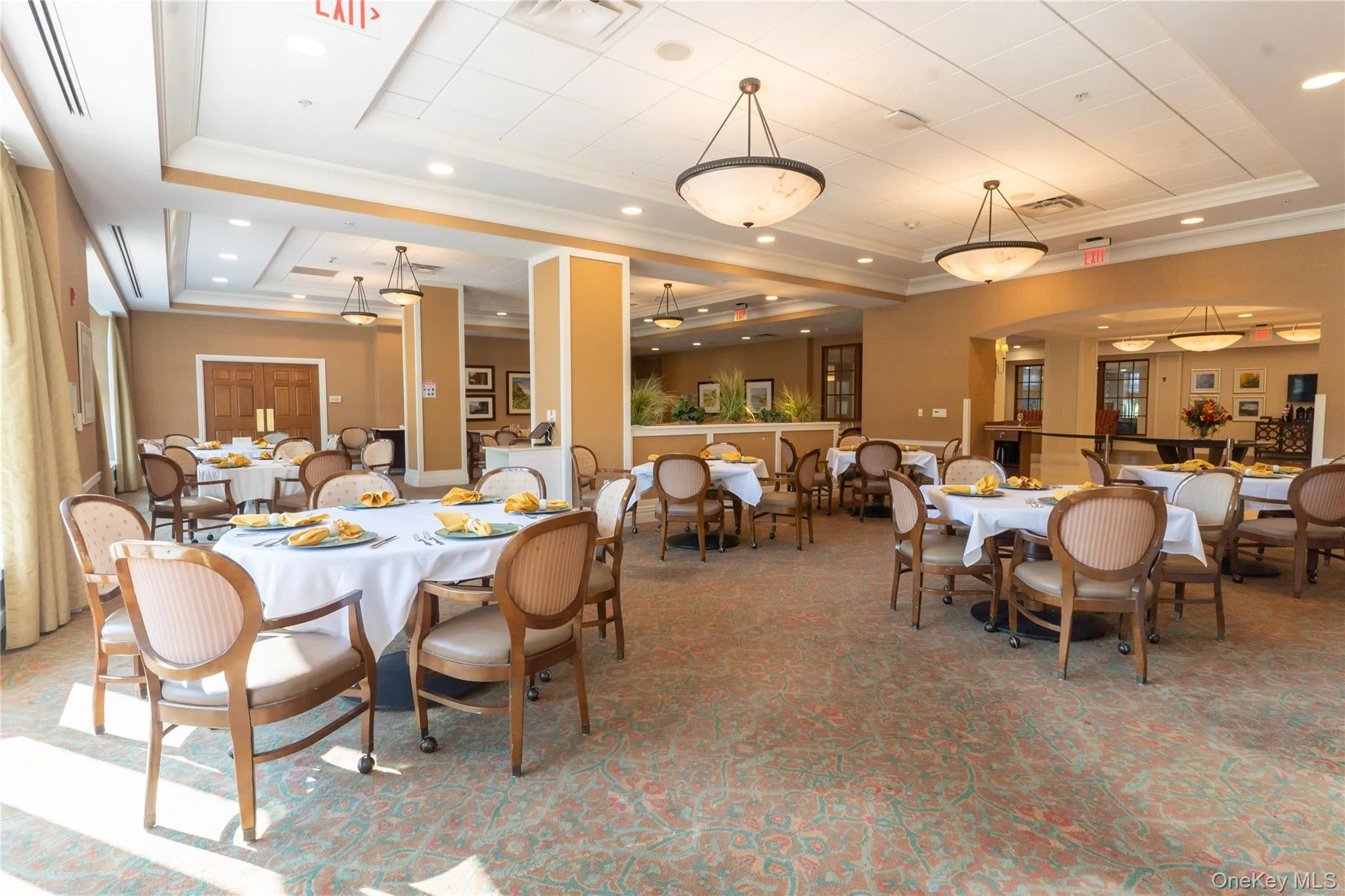 Dining room featuring a tray ceiling, crown molding, carpet flooring, and recessed lighting Dining room featuring a tray ceiling, crown molding, carpet flooring, and recessed lighting