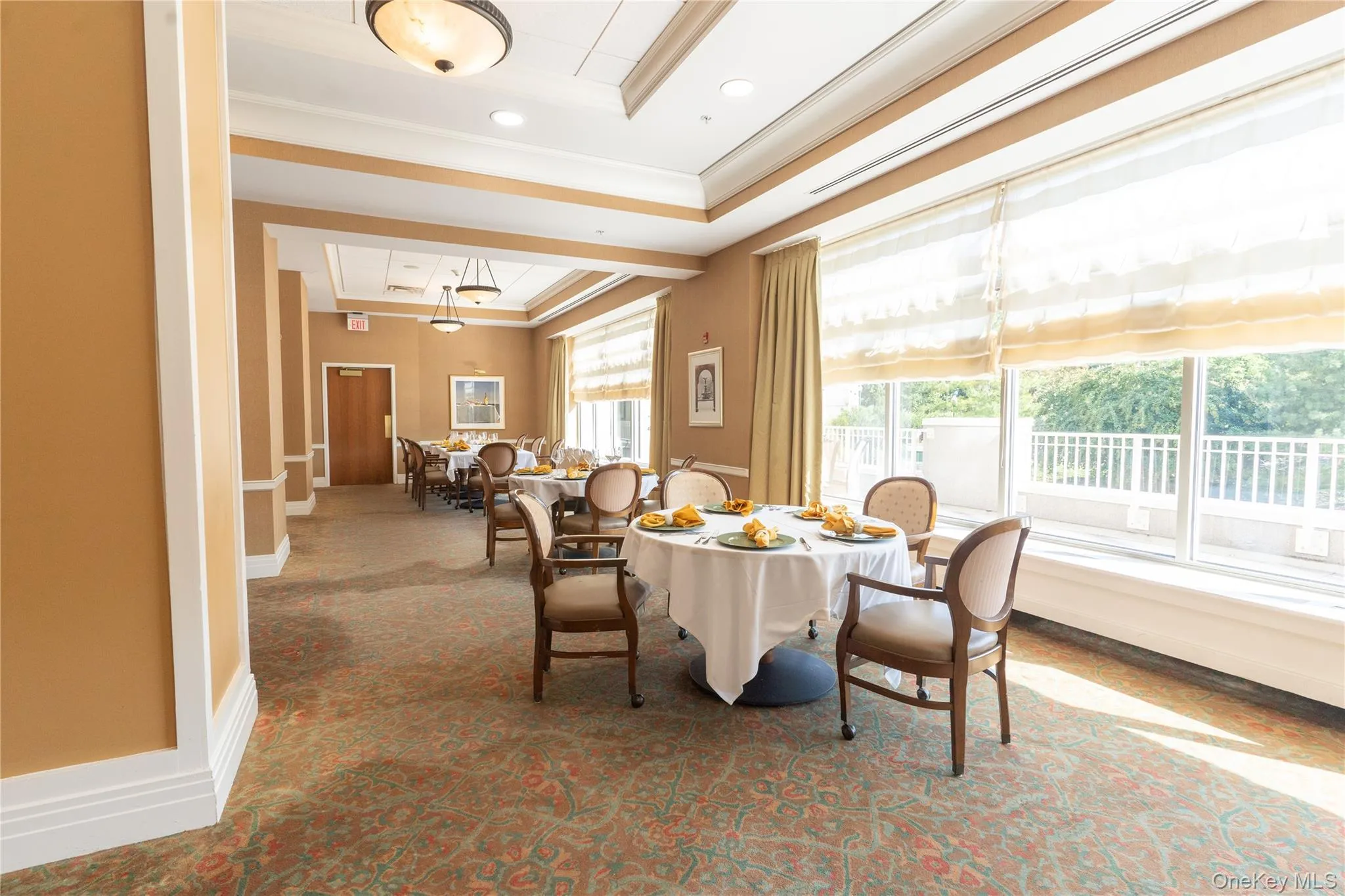 Dining room with a view of the outdoor patio. Dining room with a view of the outdoor patio.