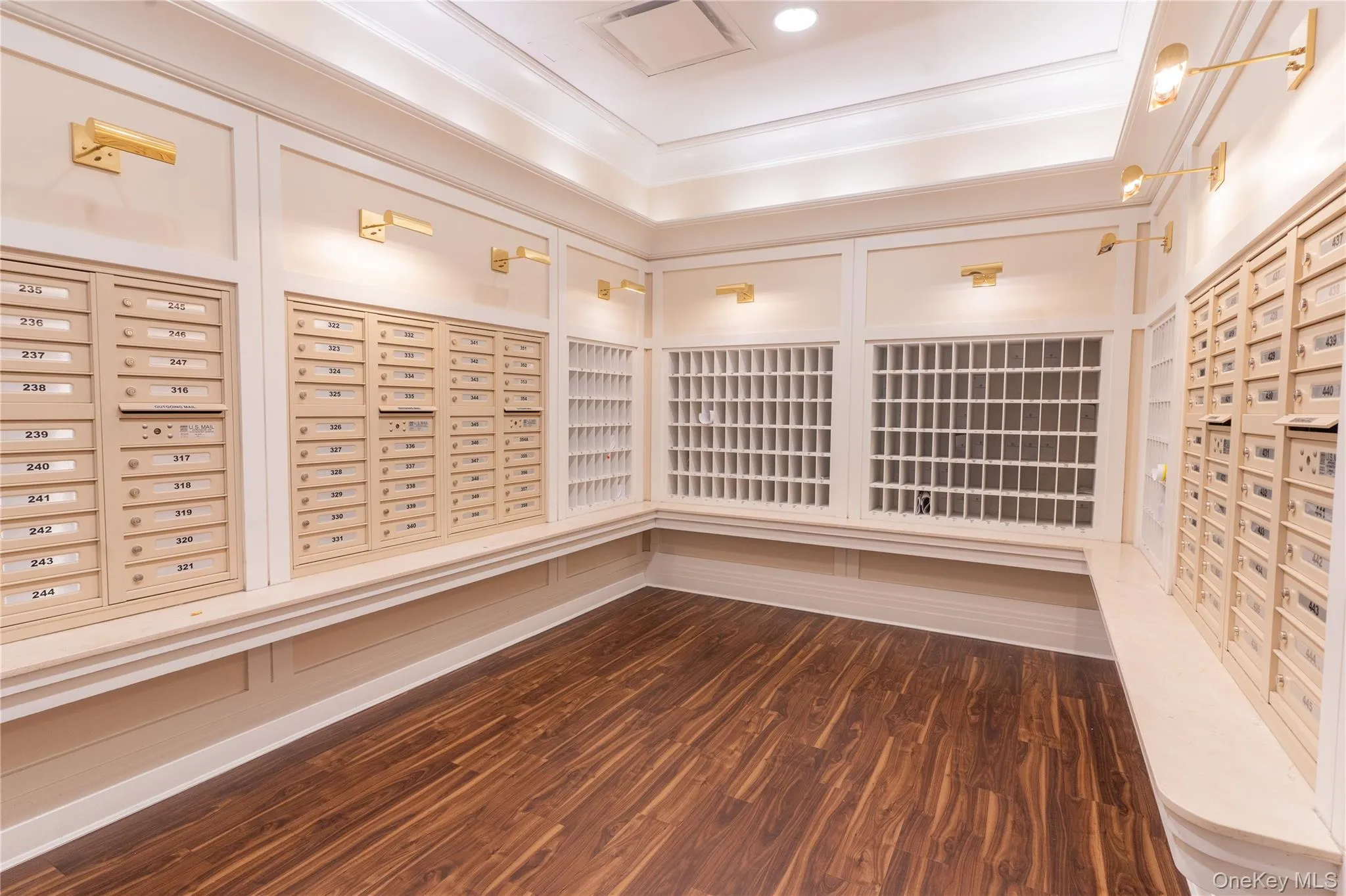 View of mail room and cubby boxes for announcements and community newsletters View of mail room and cubby boxes for announcements and community newsletters