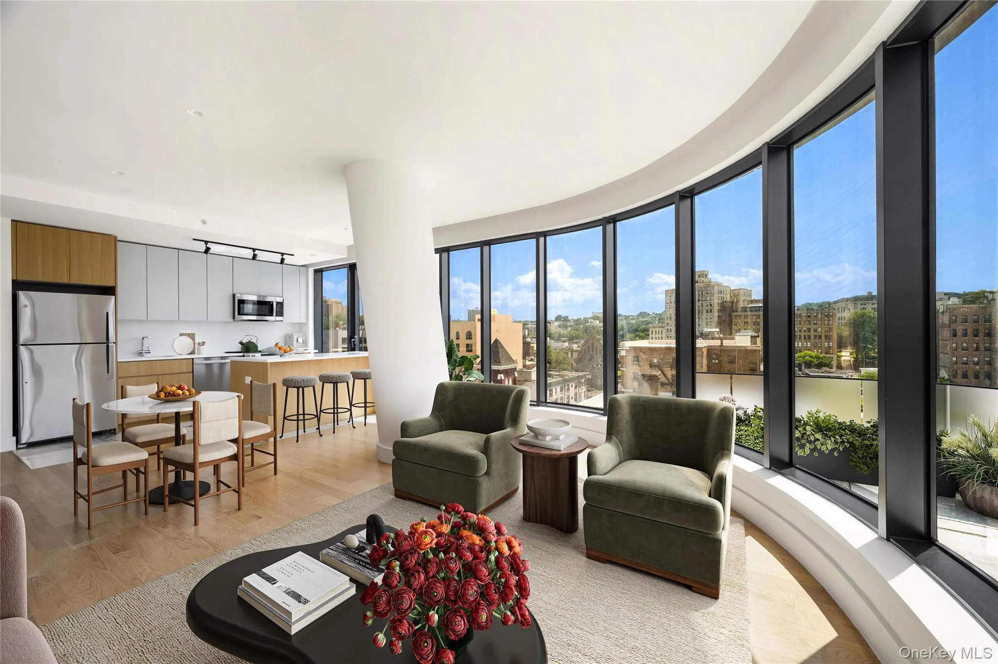 Living area with light wood finished floors Living area with light wood finished floors