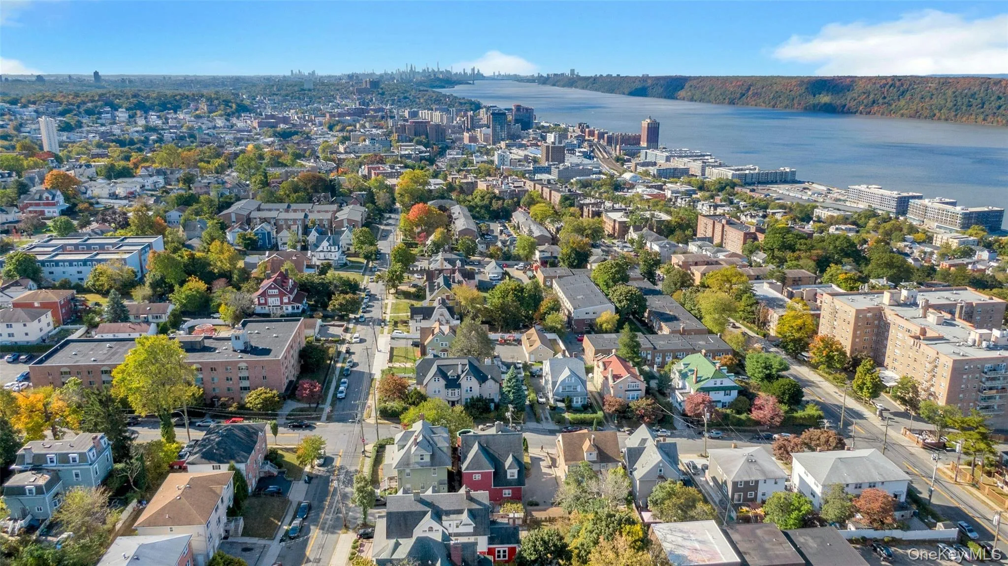 View of urban area featuring a large body of water View of urban area featuring a large body of water