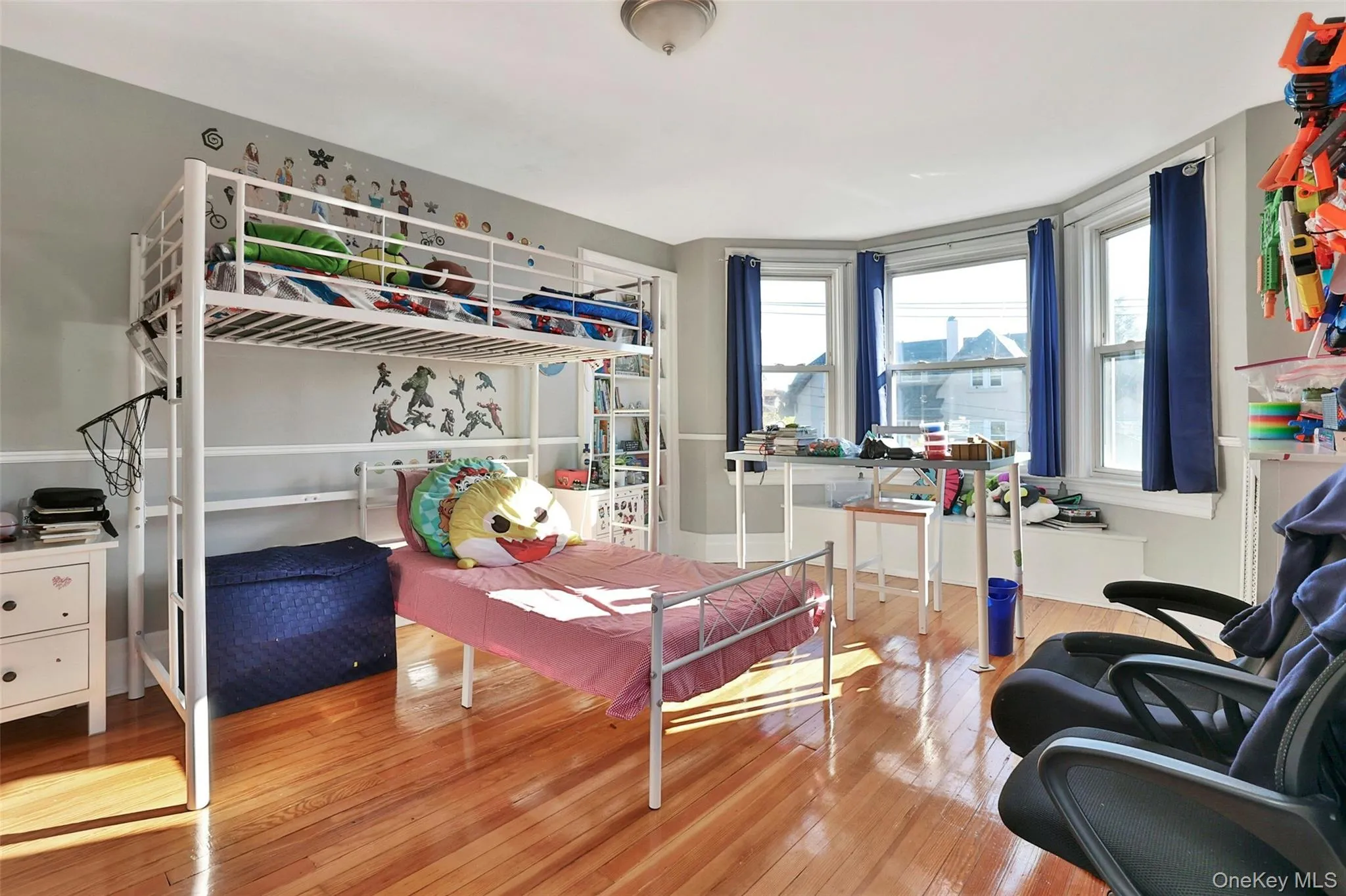 Bedroom featuring wood-type flooring Bedroom featuring wood-type flooring