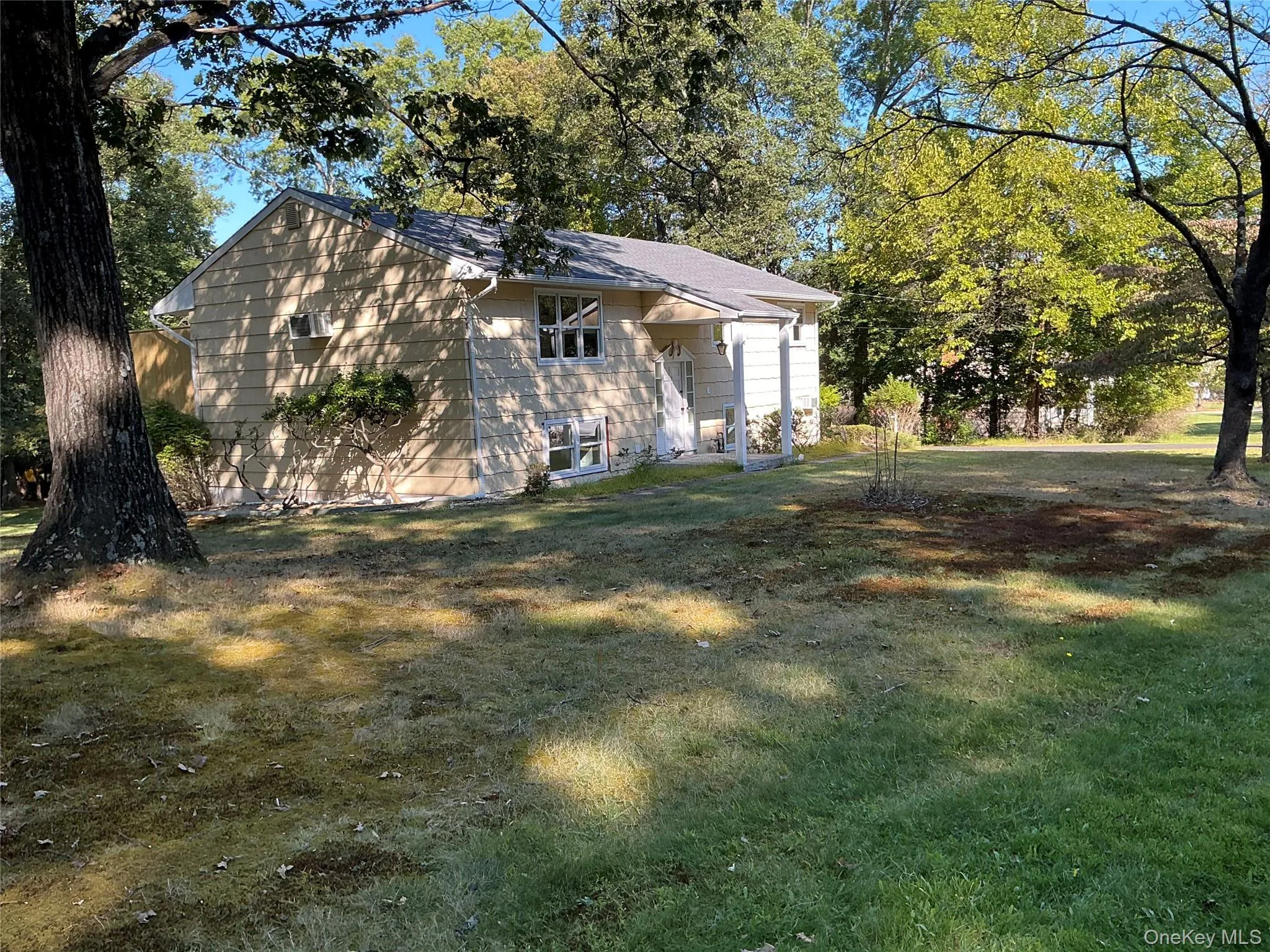 View of side of property with a yard View of side of property with a yard