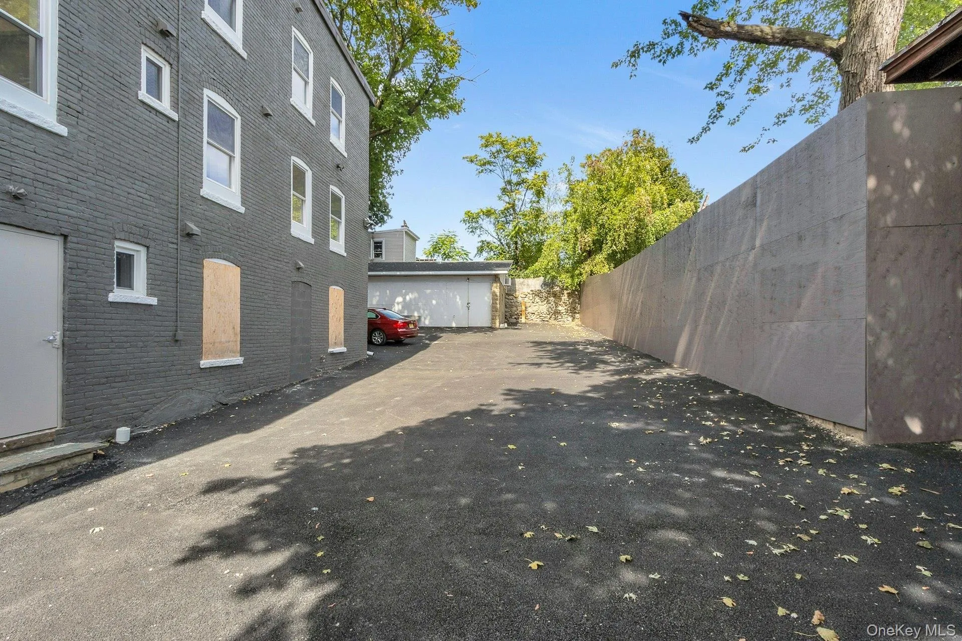 View of side of property with brick siding View of side of property with brick siding