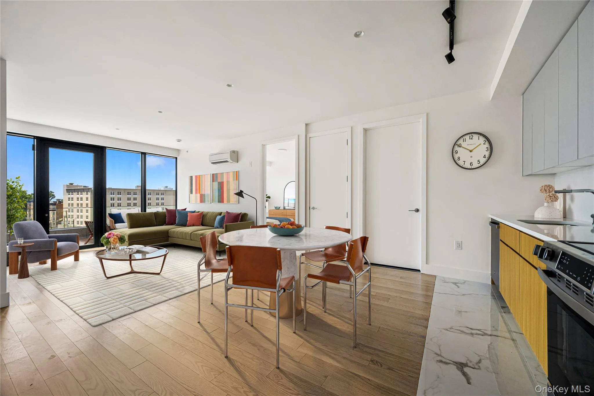 Dining room featuring baseboards and light wood-style flooring Dining room featuring baseboards and light wood-style flooring