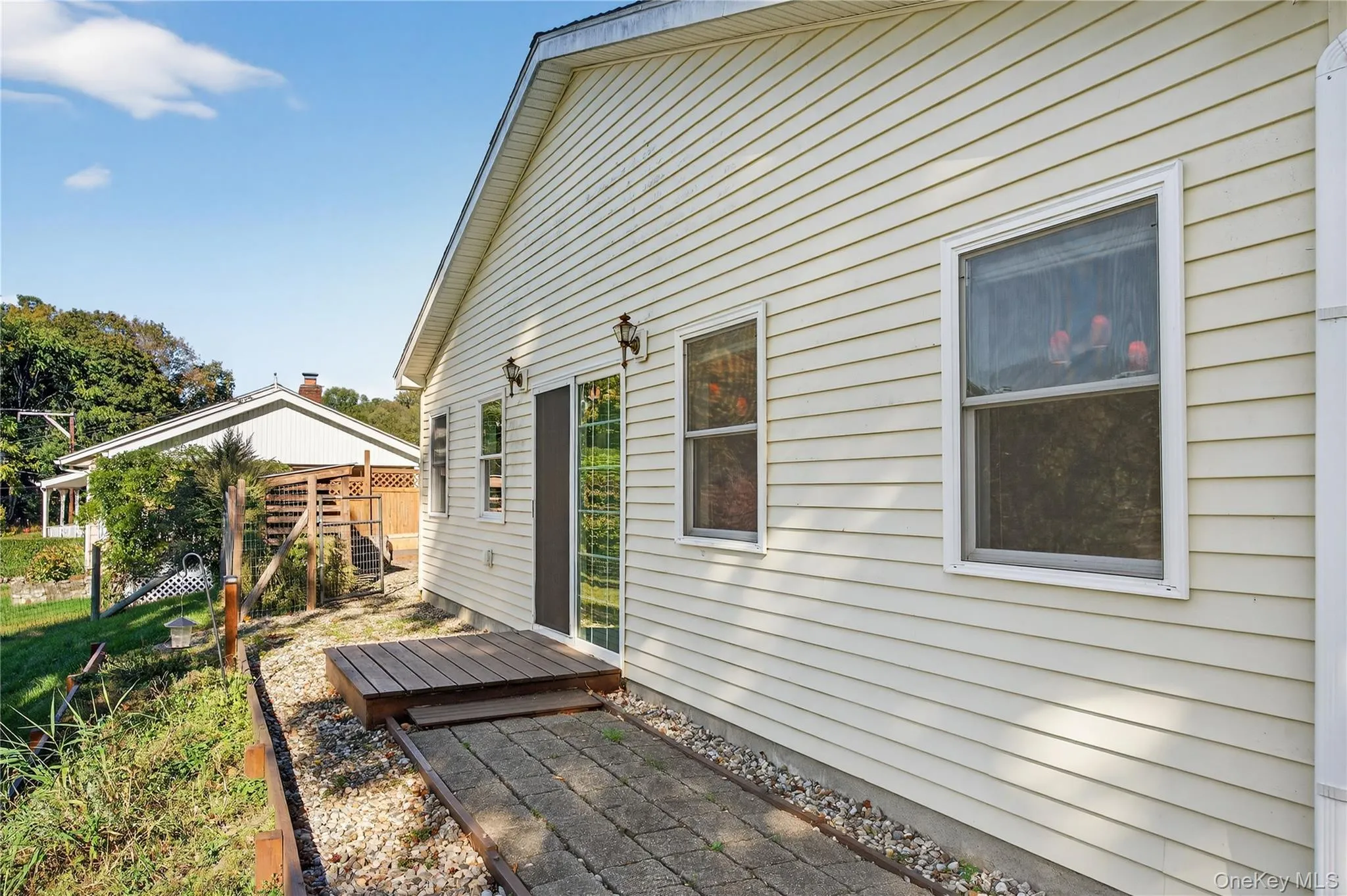 View of patio / terrace featuring a wooden deck View of patio / terrace featuring a wooden deck