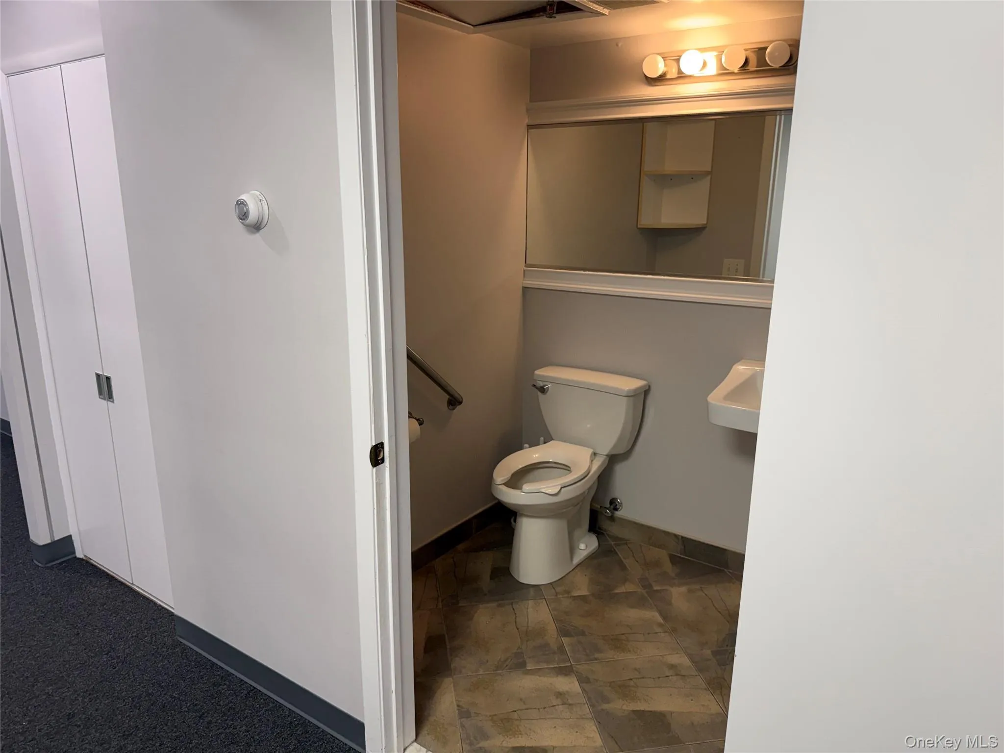 Half bathroom with toilet Half bathroom with toilet