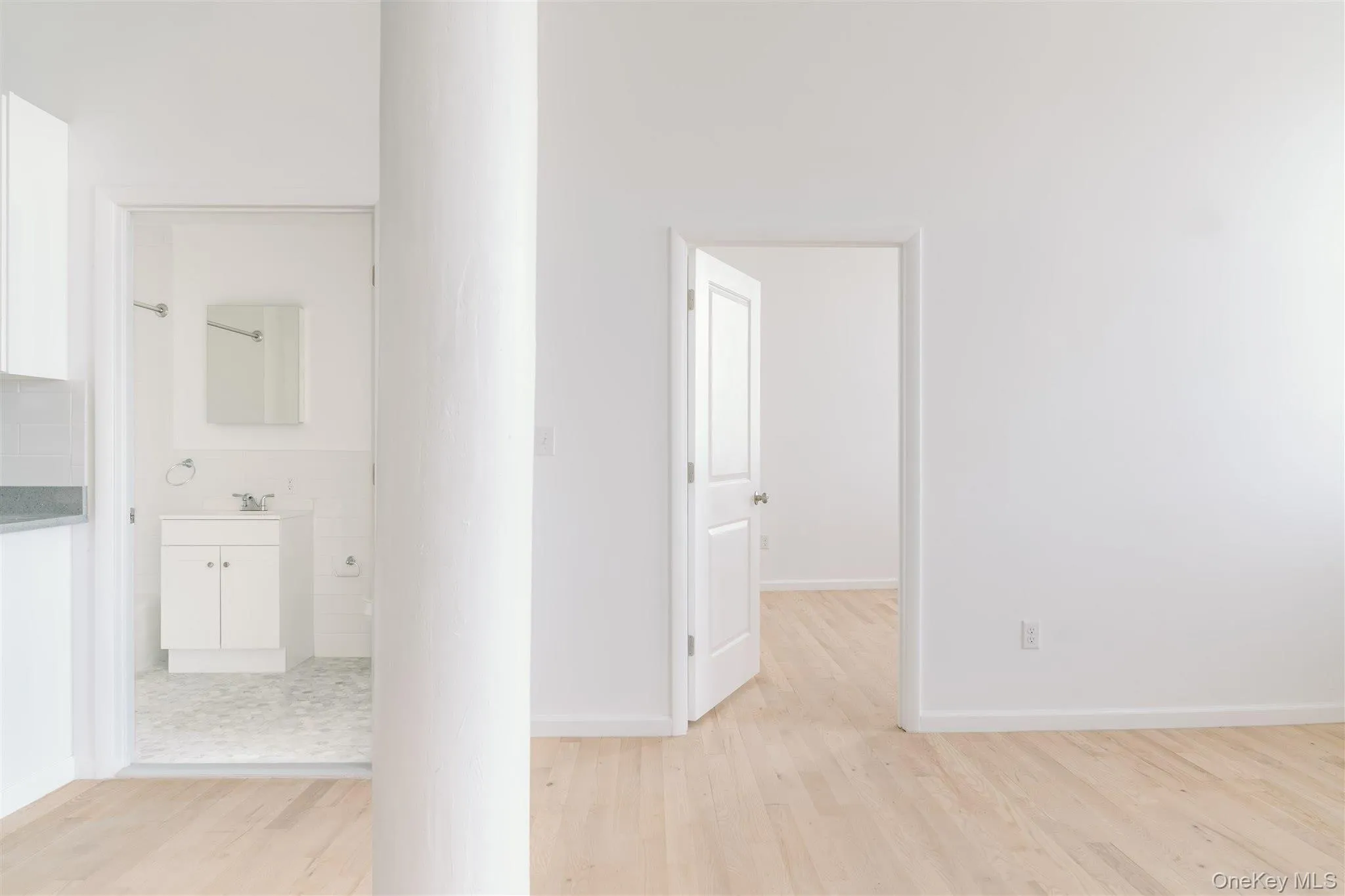 Hallway with light wood-type flooring Hallway with light wood-type flooring