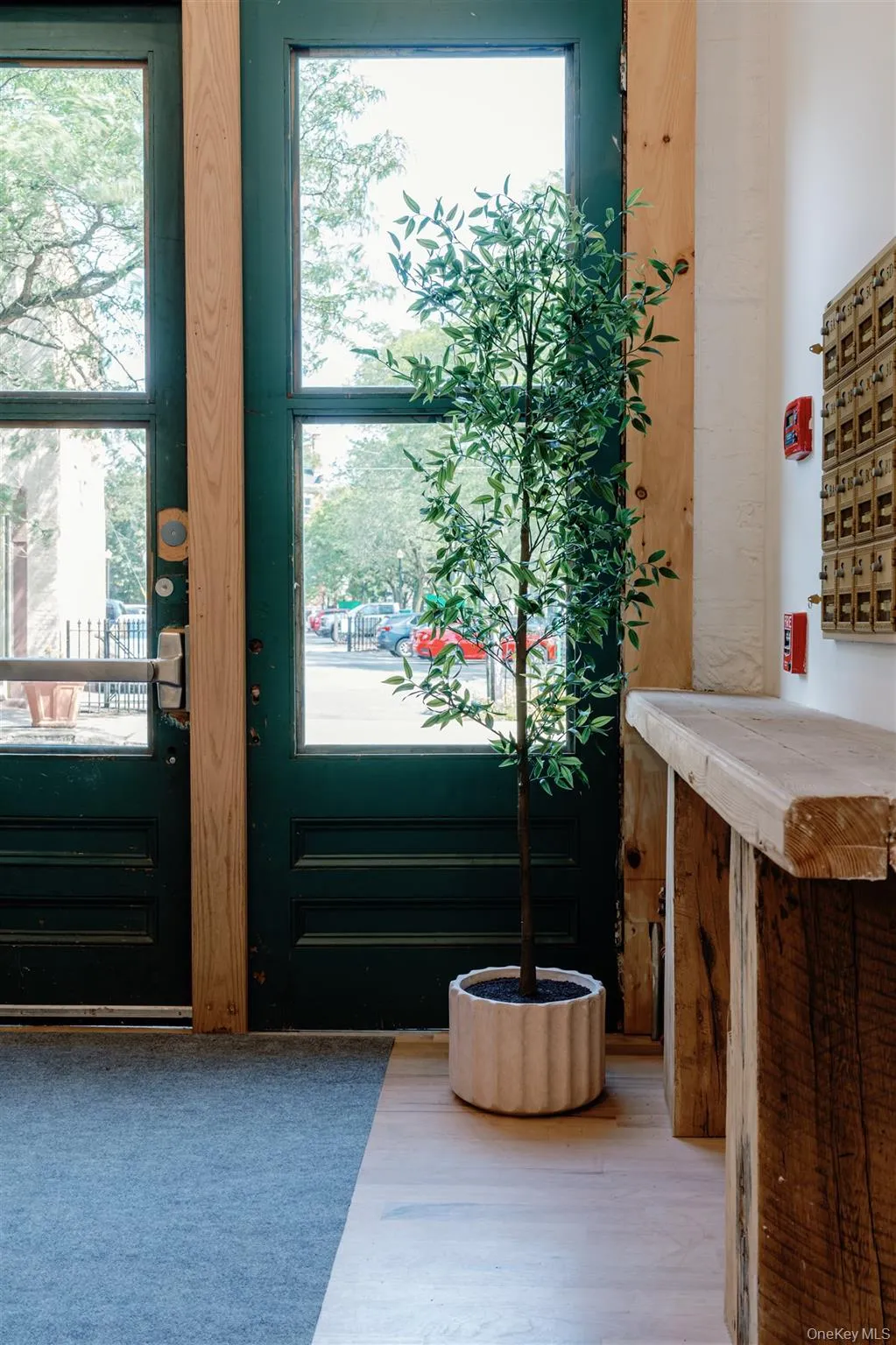 Entryway featuring wood finished floors and plenty of natural light Entryway featuring wood finished floors and plenty of natural light
