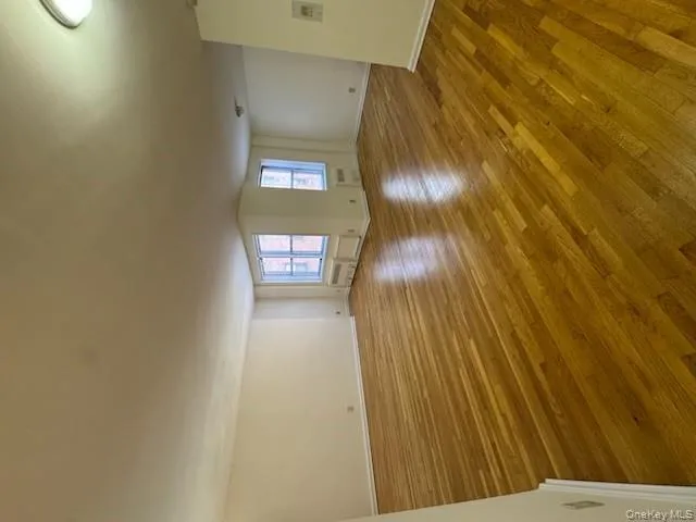 Spare room with light wood-style flooring Spare room with light wood-style flooring