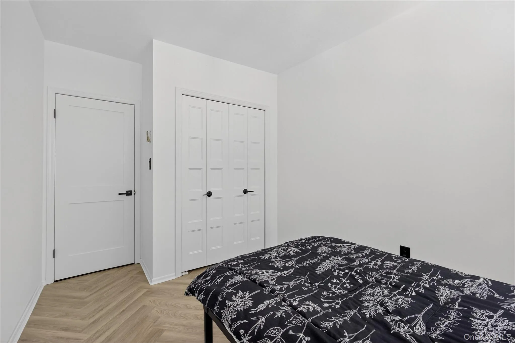 Bedroom featuring a closet Bedroom featuring a closet