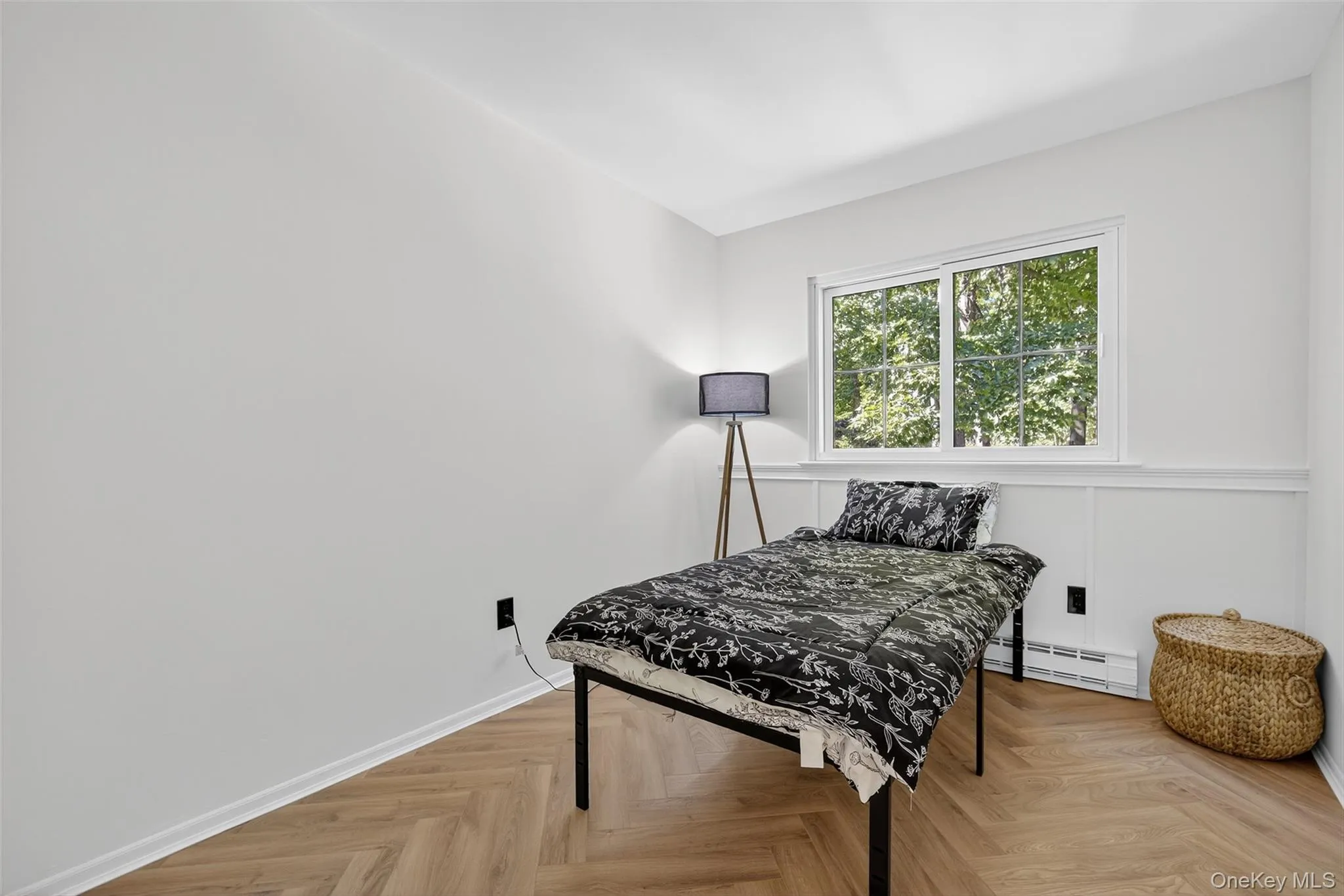 Bedroom featuring baseboard heating Bedroom featuring baseboard heating