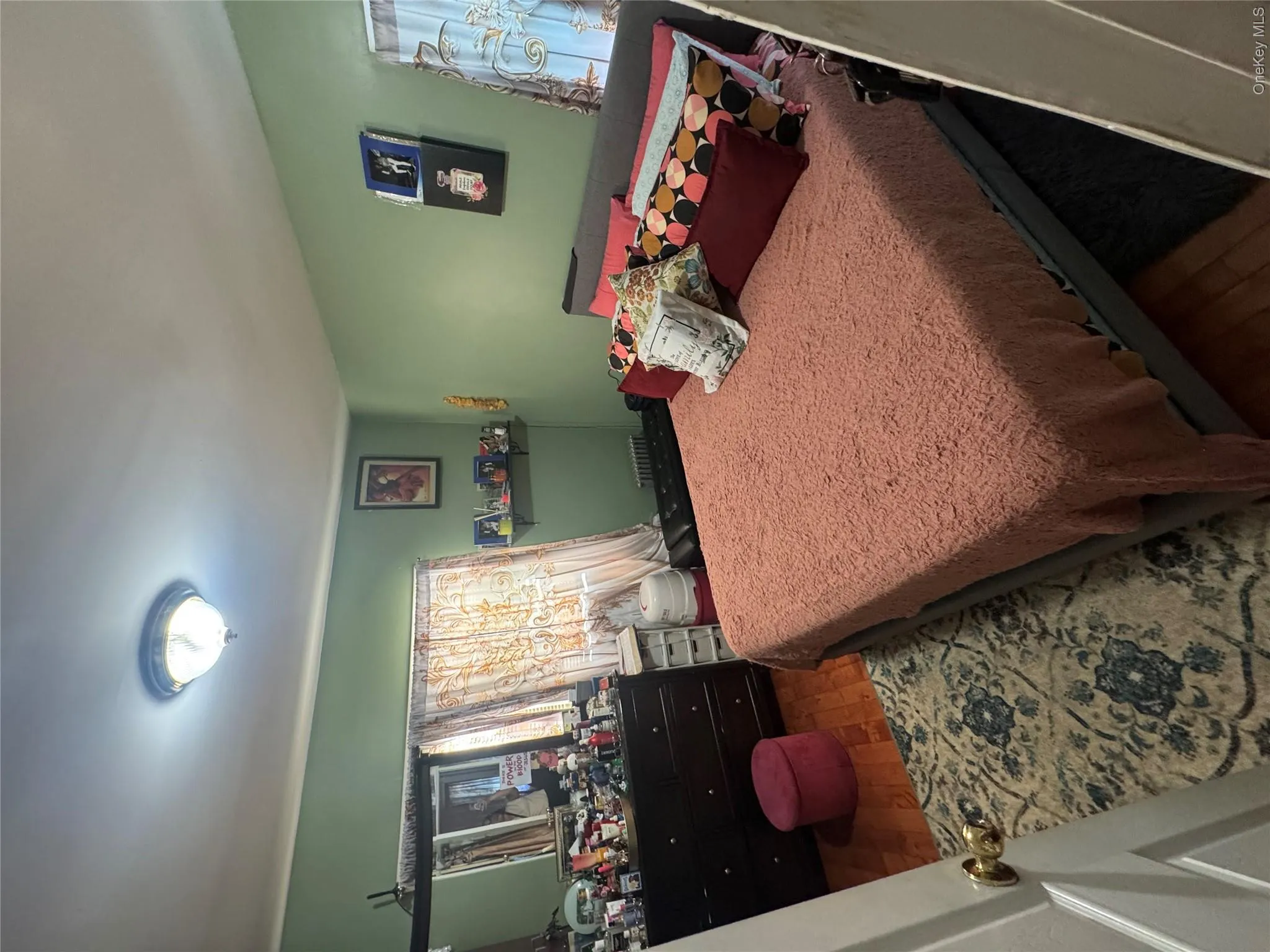 Bedroom featuring wood finished floors Bedroom featuring wood finished floors