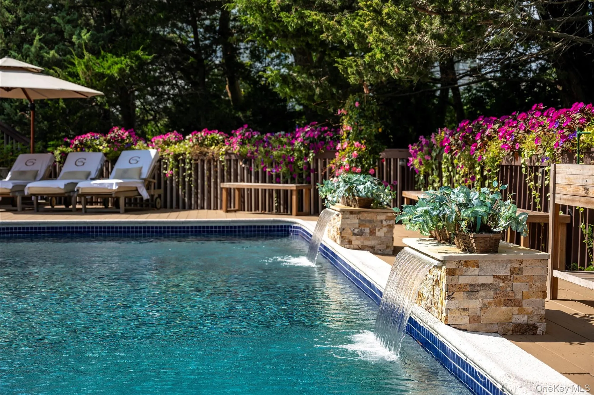 View of swimming pool with a patio area View of swimming pool with a patio area