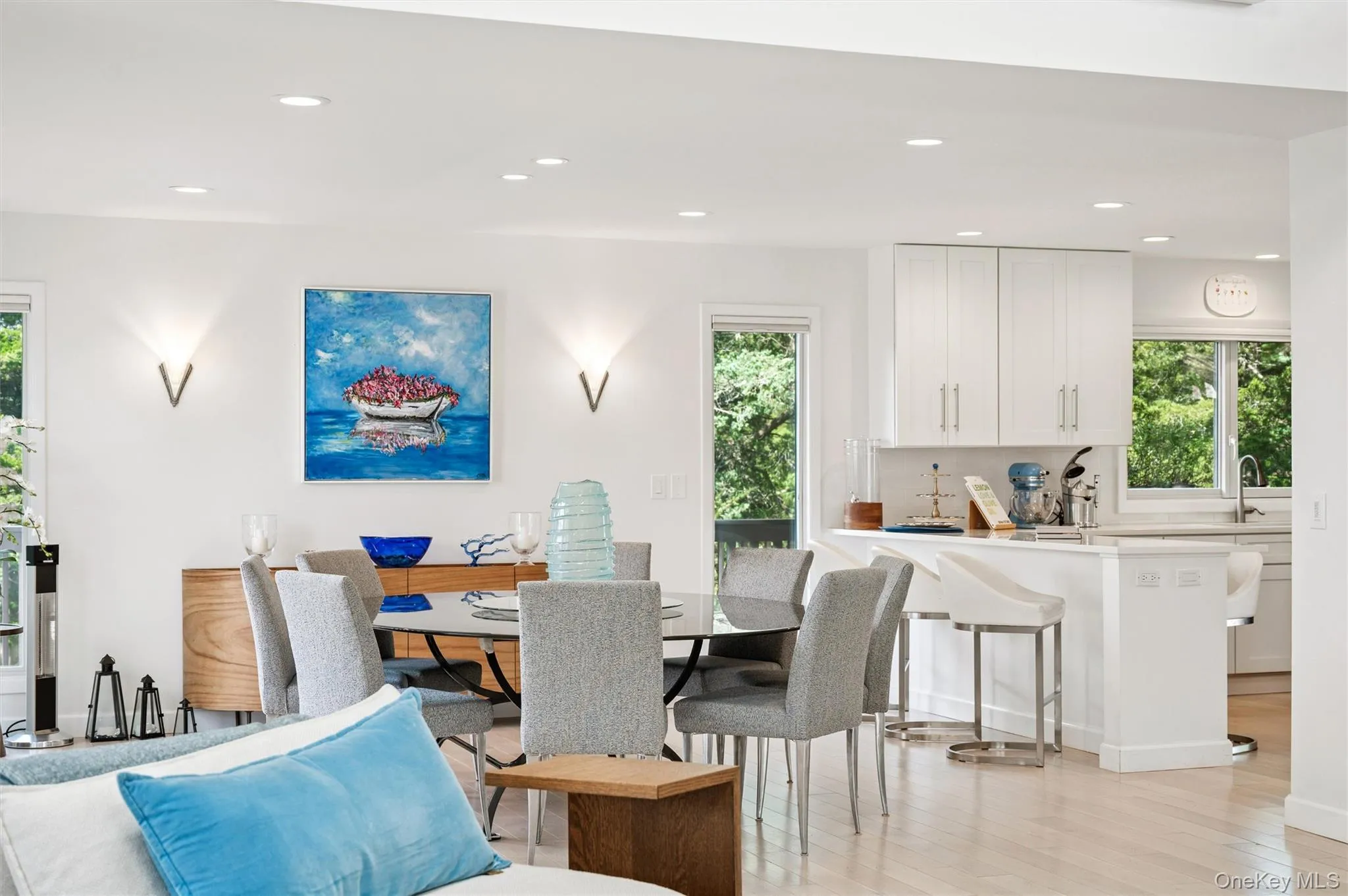 Dining area featuring recessed lighting and light wood-style flooring Dining area featuring recessed lighting and light wood-style flooring