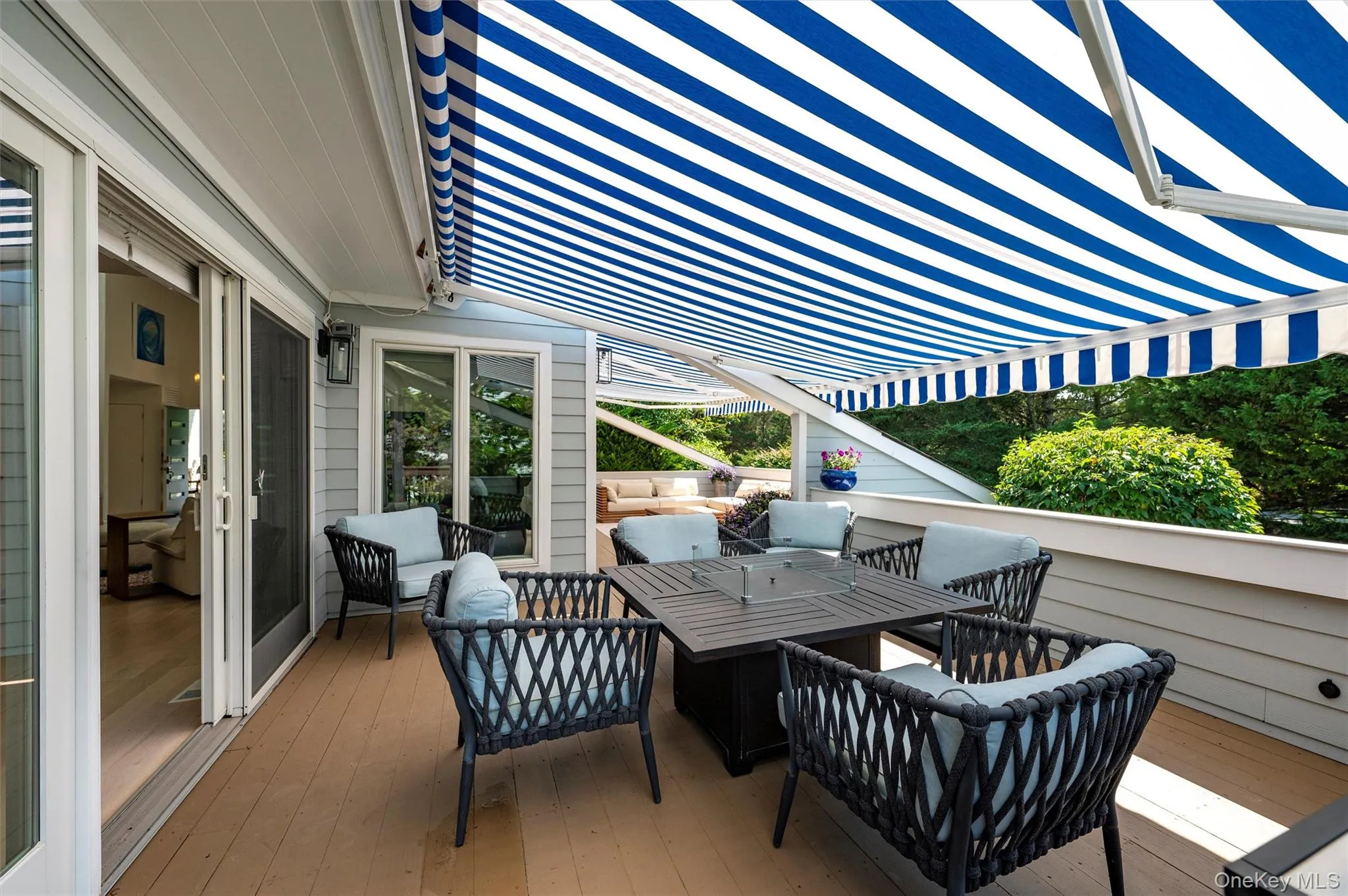 Wooden terrace with outdoor dining space Wooden terrace with outdoor dining space