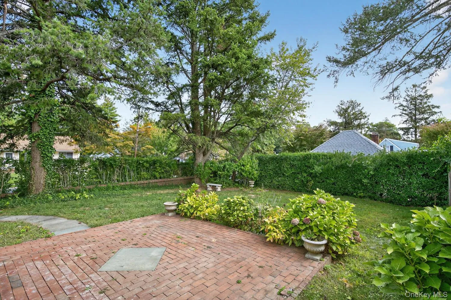 Lovely brick patio overlooking yard Lovely brick patio overlooking yard