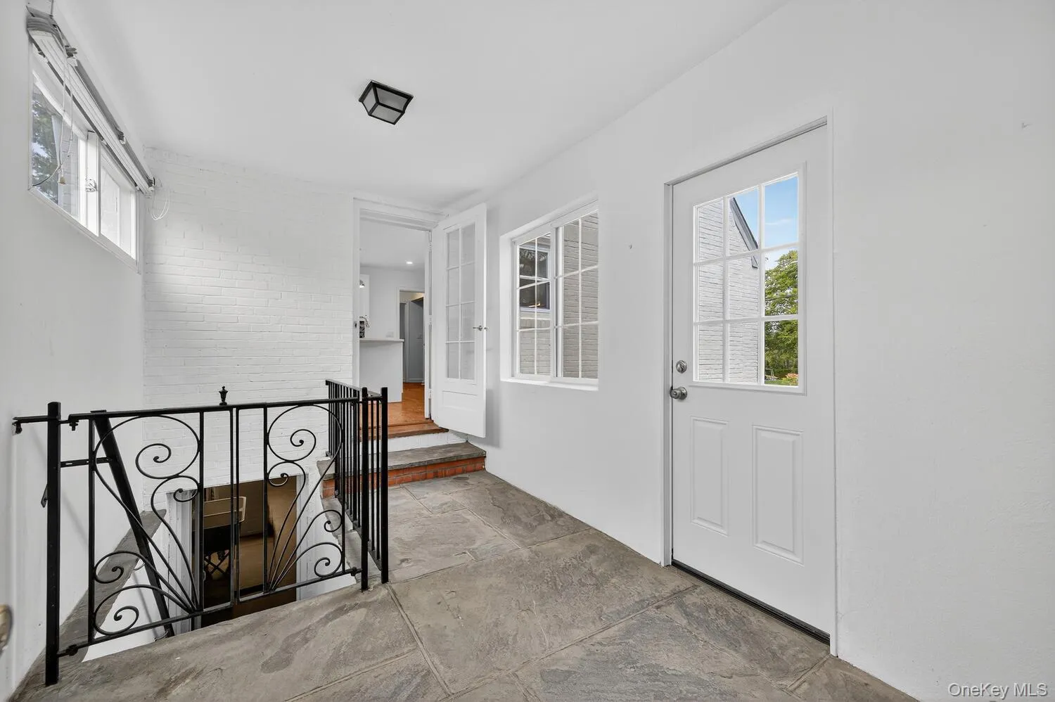 Breezeway. between garage and kitchen. Breezeway. between garage and kitchen.