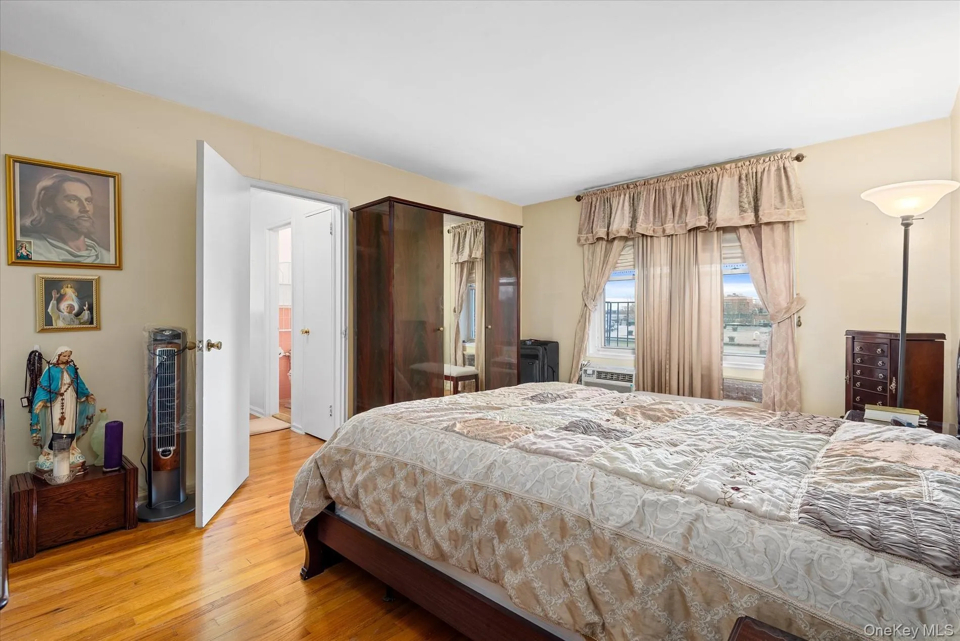 Bedroom with wood finished floors Bedroom with wood finished floors