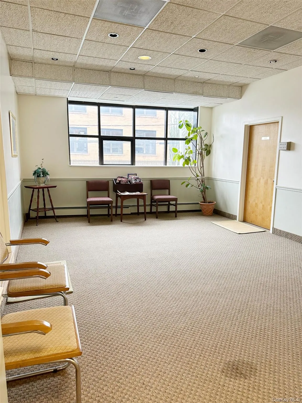 Common area with a drop ceiling Common area with a drop ceiling