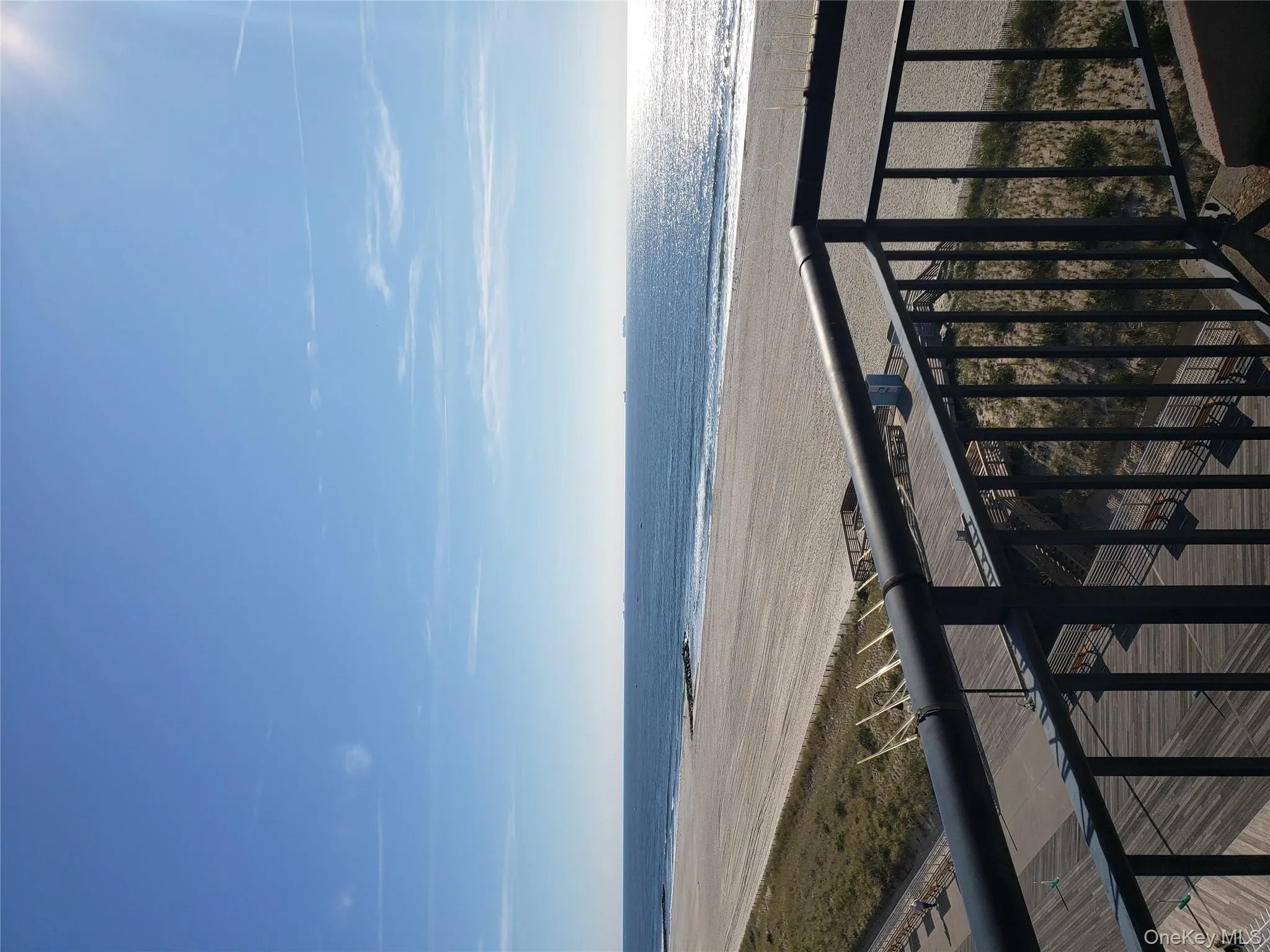 Water view featuring nearby beach Water view featuring nearby beach