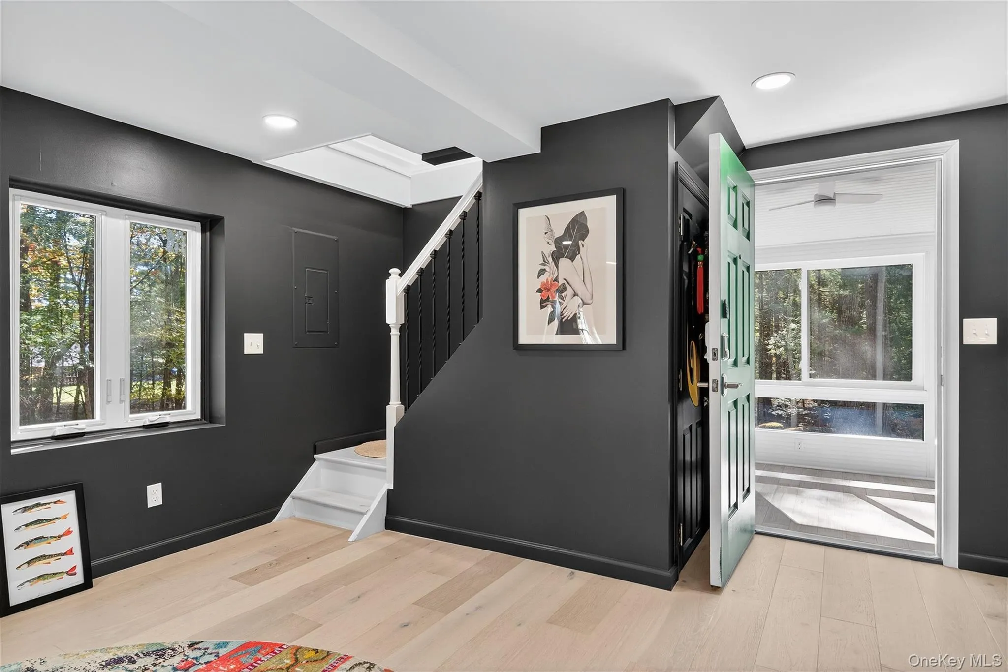 View of entrance to sunroom and stairway to bedroom View of entrance to sunroom and stairway to bedroom