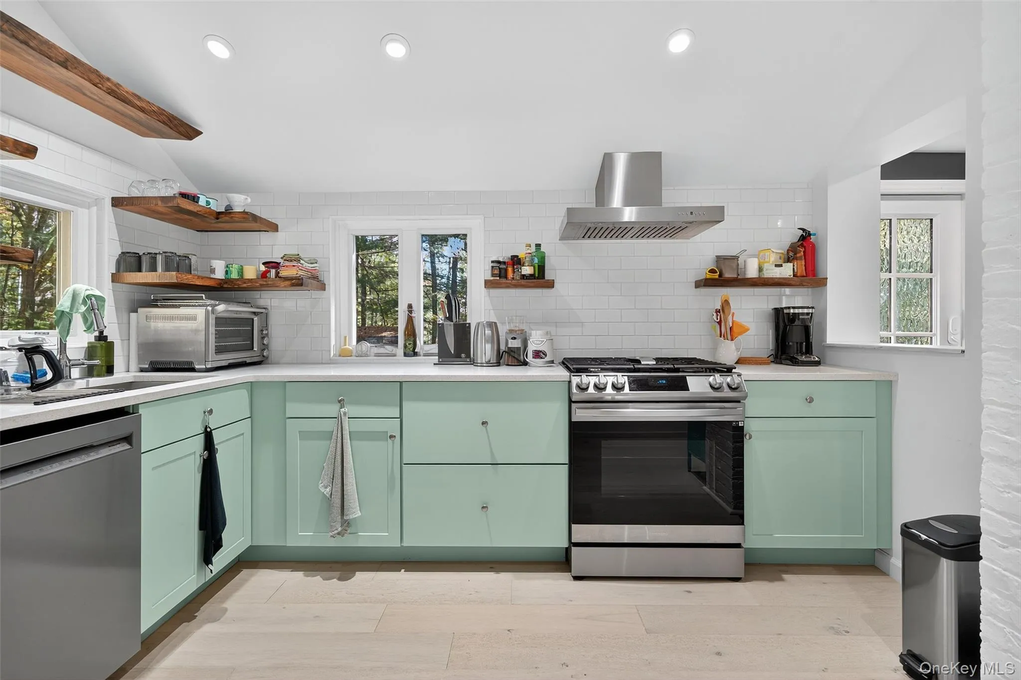 Another view of kitchen with lots of storage shelves and cabinets Another view of kitchen with lots of storage shelves and cabinets