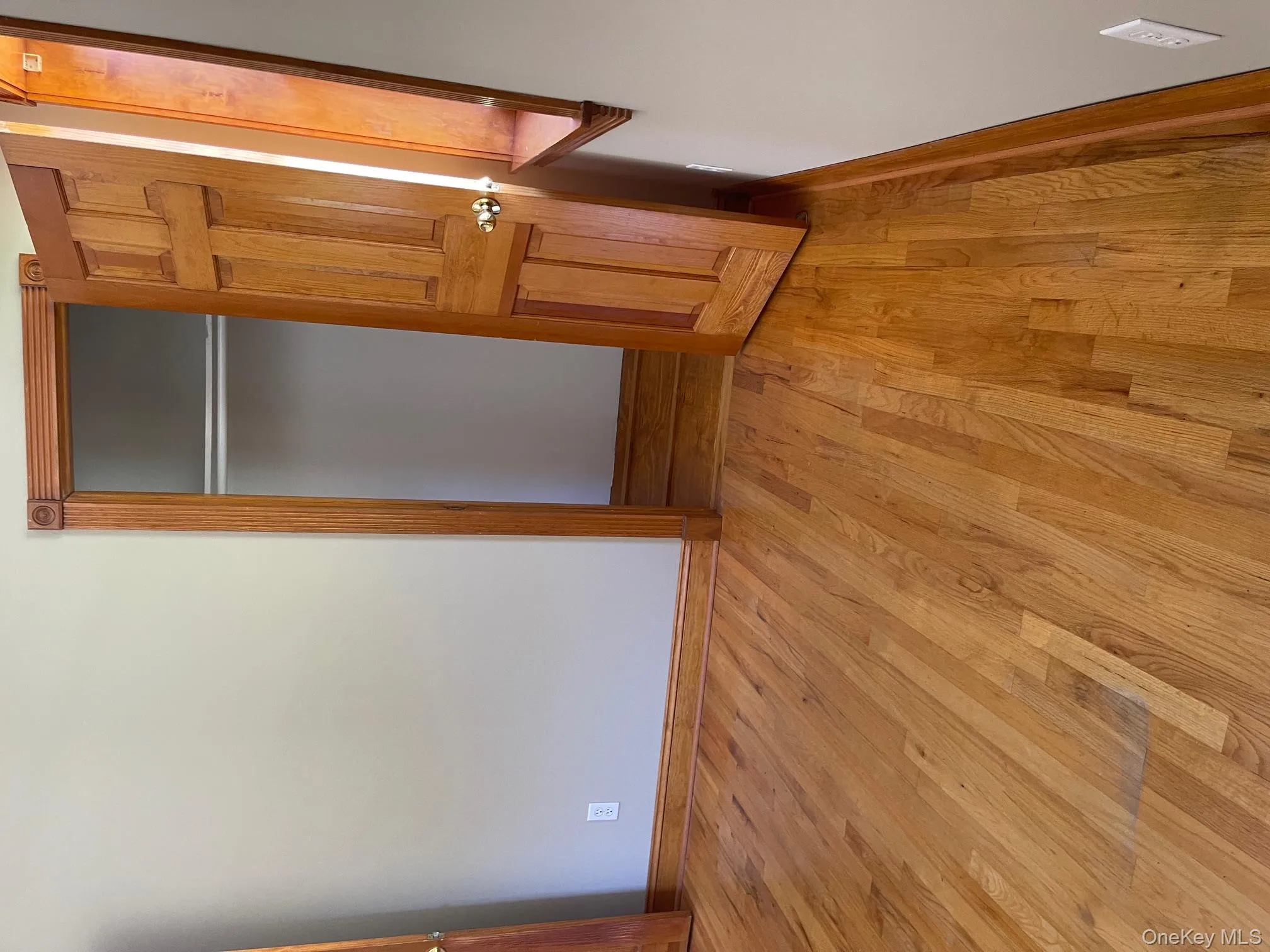 Unfurnished bedroom with light wood-style floors and a closet Unfurnished bedroom with light wood-style floors and a closet