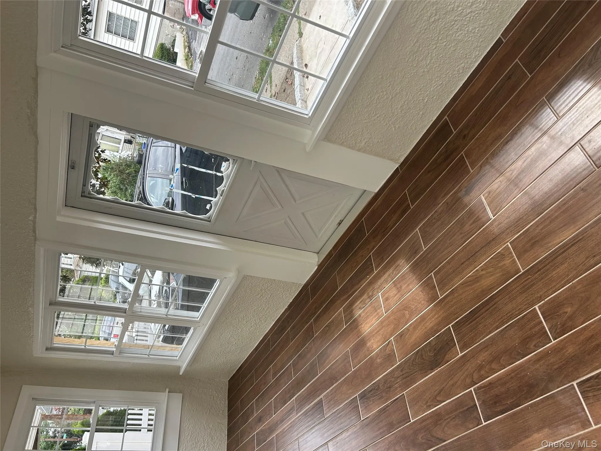 Unfurnished sunroom featuring plenty of natural light Unfurnished sunroom featuring plenty of natural light