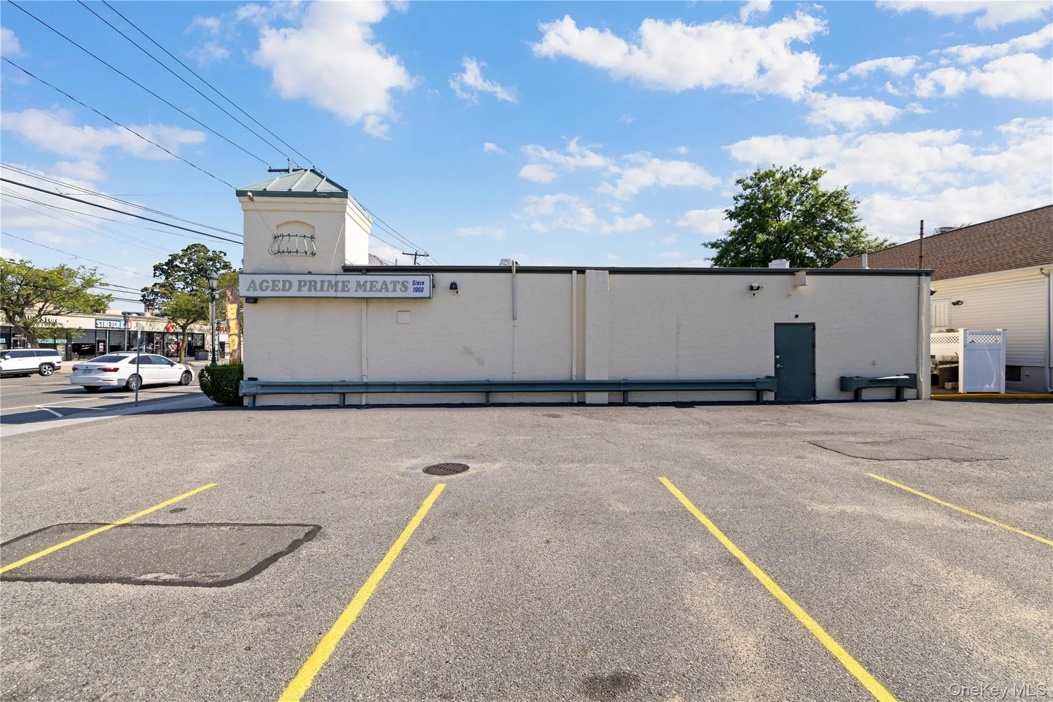 View of uncovered parking lot View of uncovered parking lot