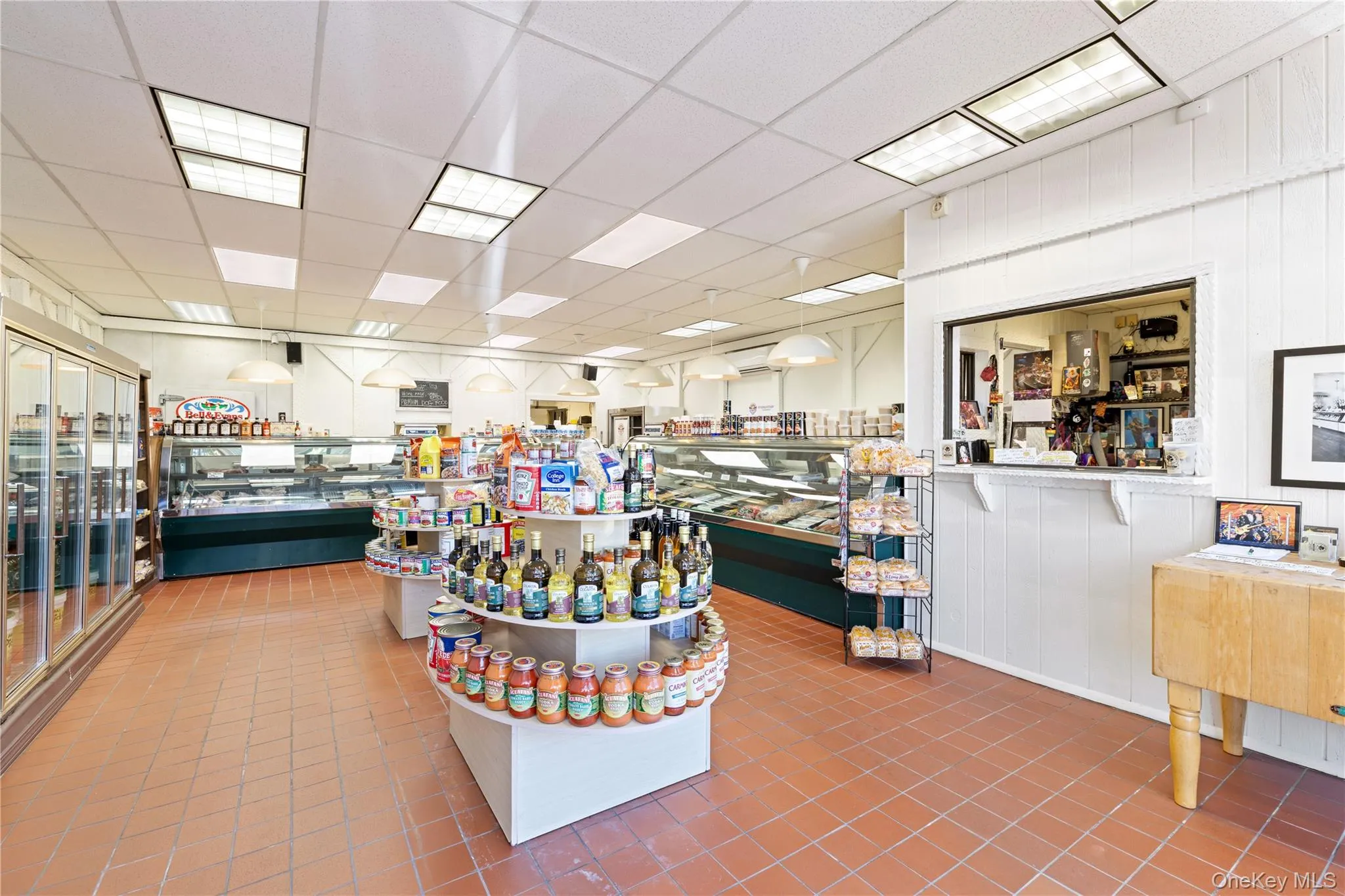Miscellaneous room with a drop ceiling and tile patterned floors Miscellaneous room with a drop ceiling and tile patterned floors