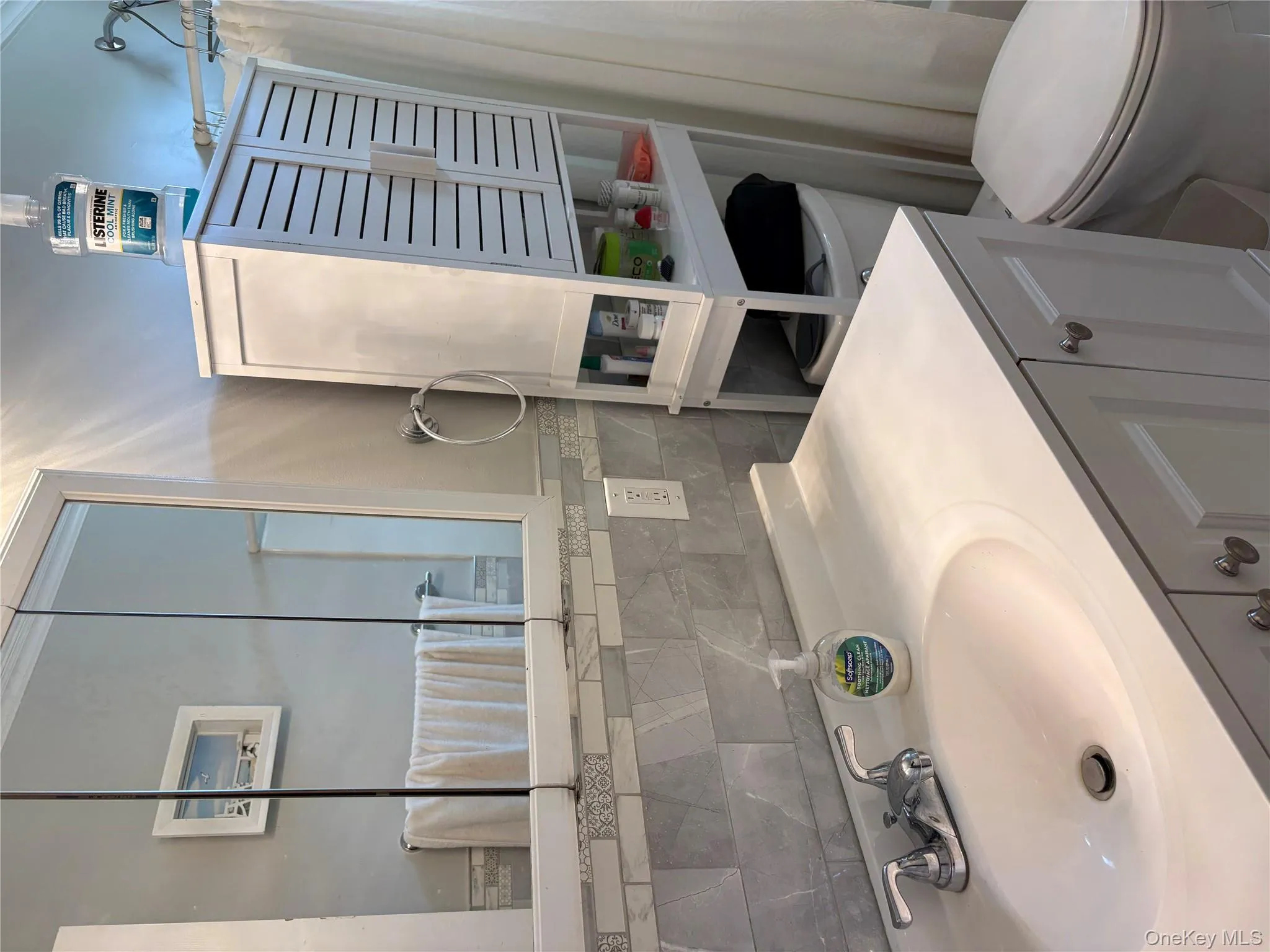 Bathroom with vanity and tile walls Bathroom with vanity and tile walls