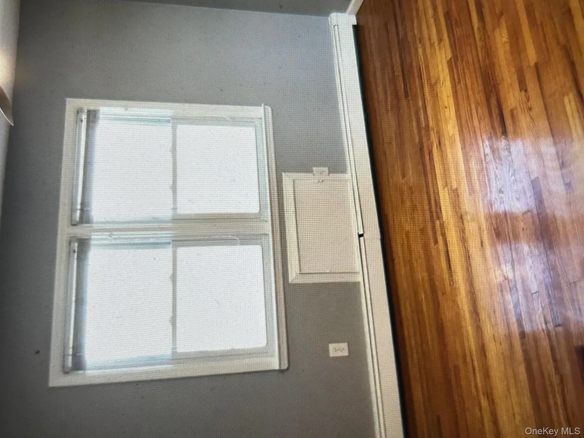 Generous Bedroom with abundant Natural Light and Hardwood floors Generous Bedroom with abundant Natural Light and Hardwood floors