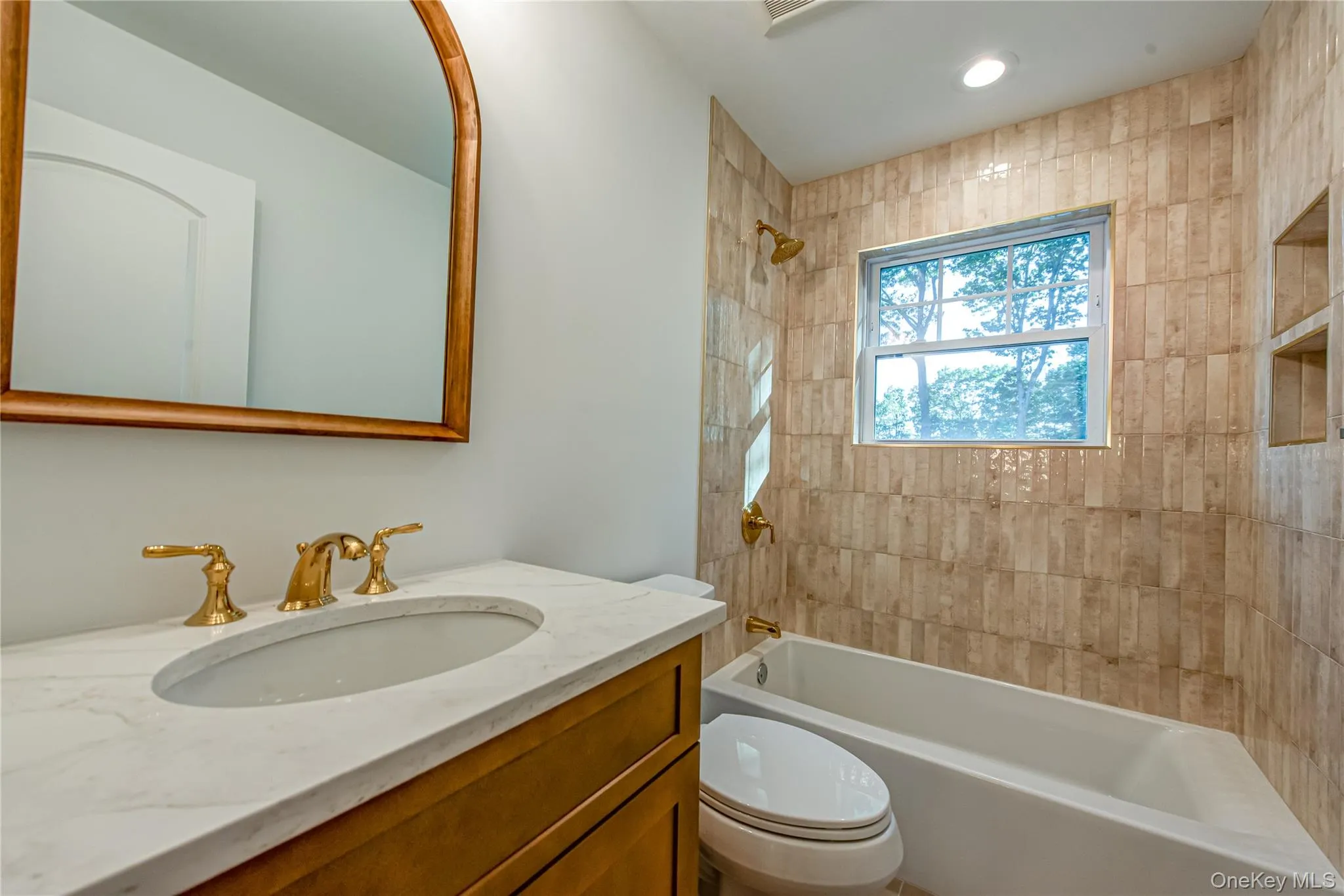 Full bathroom with vanity, tub / shower combination, and recessed lighting Full bathroom with vanity, tub / shower combination, and recessed lighting