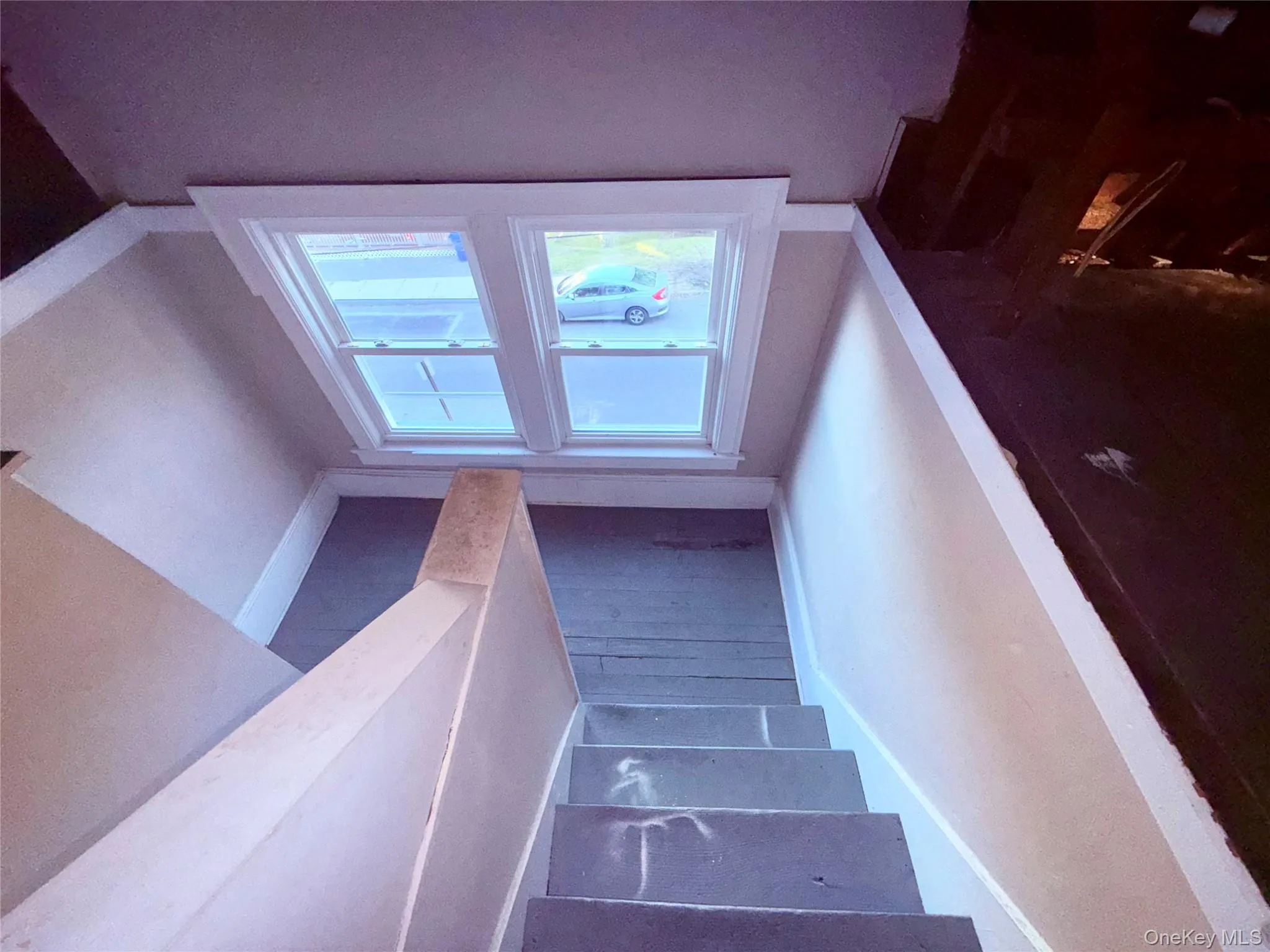 Stairs featuring baseboards Stairs featuring baseboards