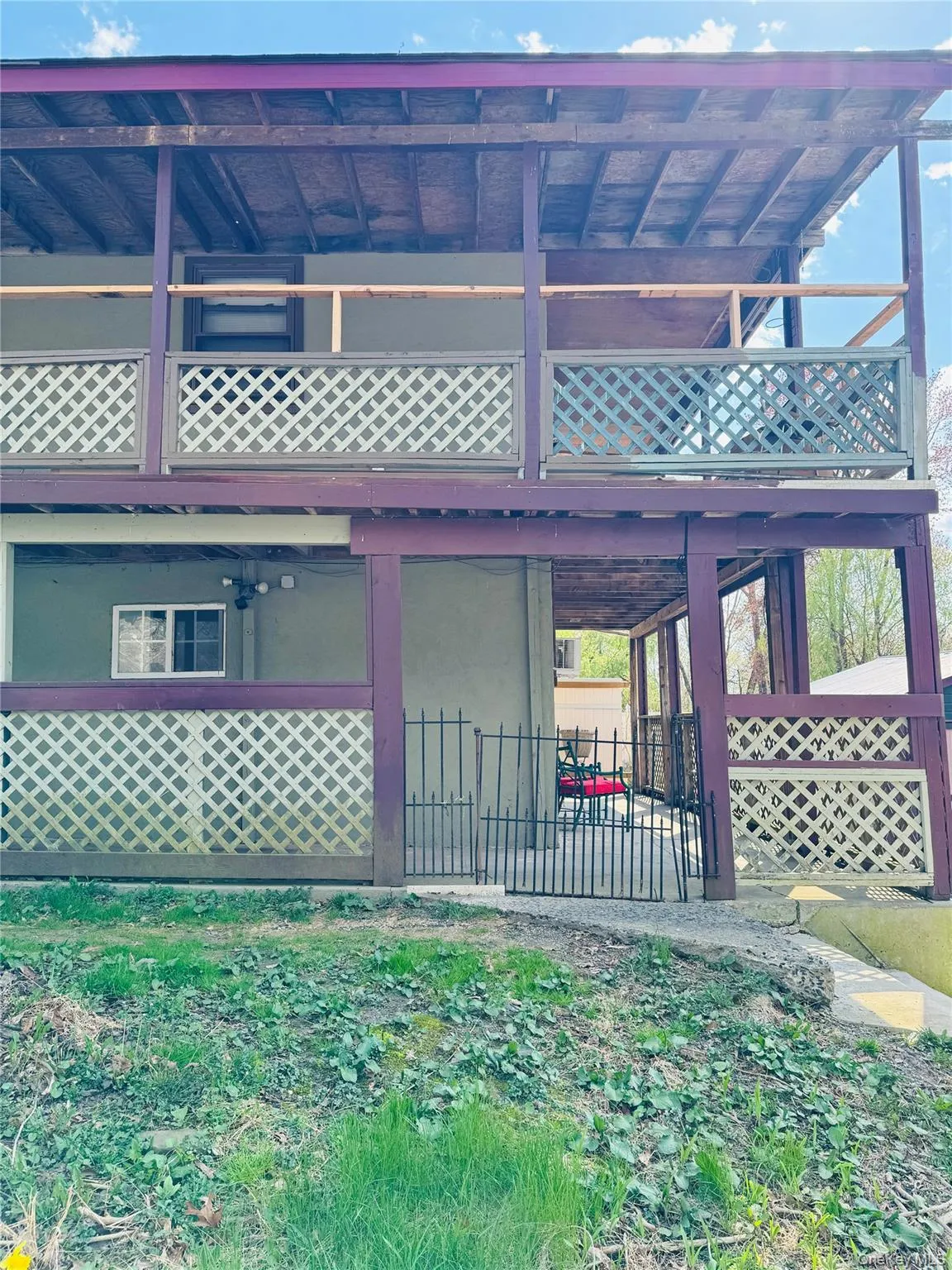 View of home's exterior featuring fence View of home's exterior featuring fence