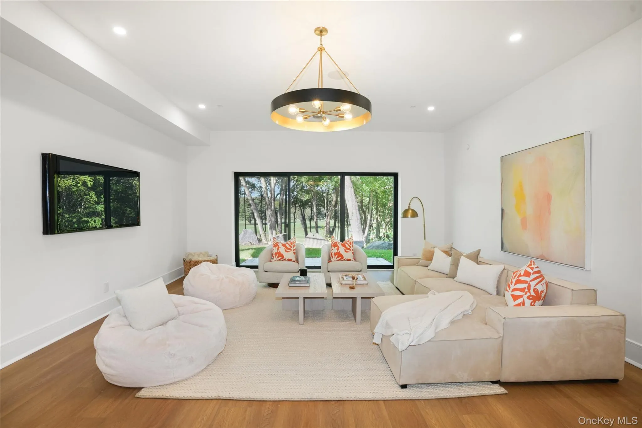 Lower level recreation room with sliding glass doors to side yard Lower level recreation room with sliding glass doors to side yard