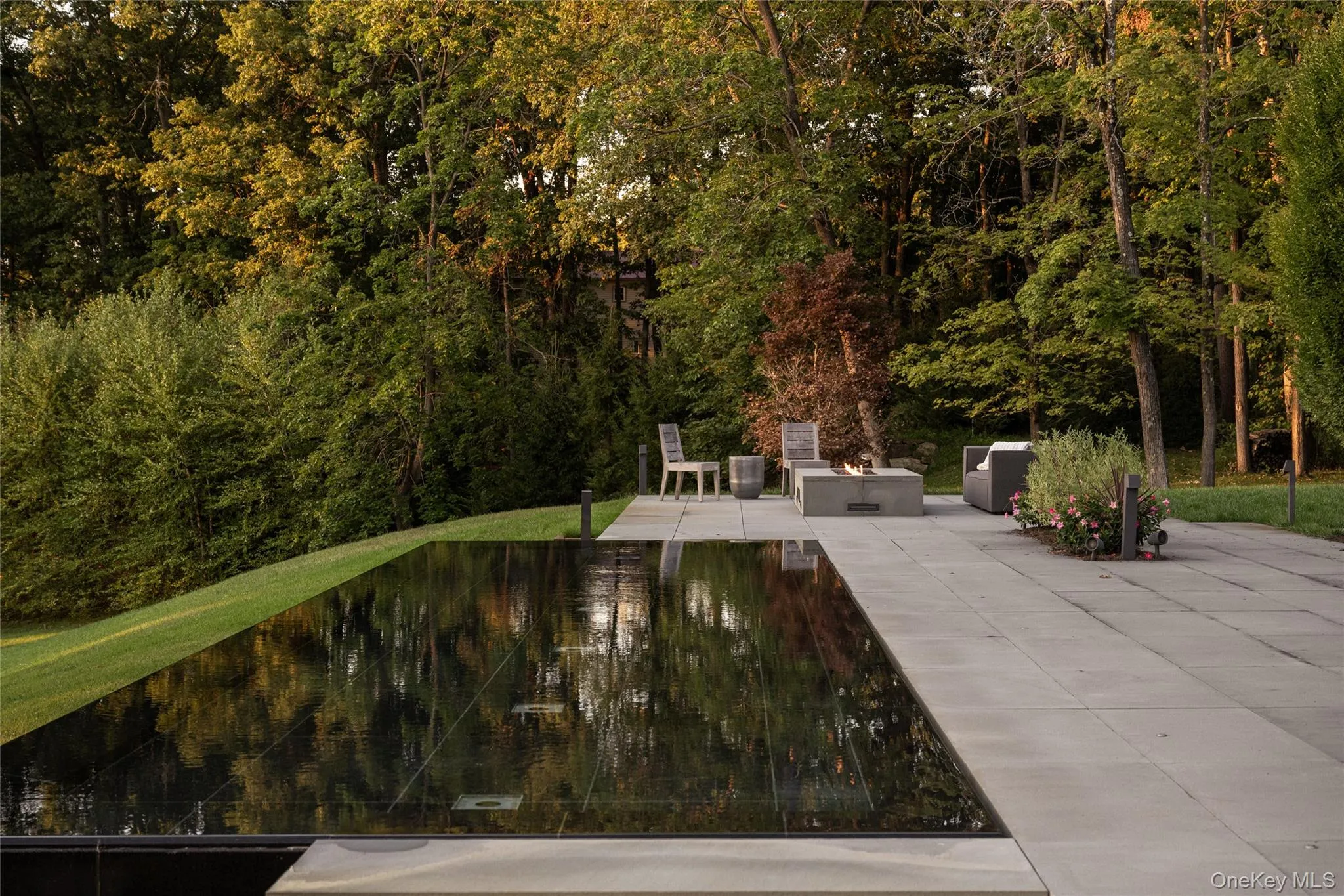 View of property's community featuring a patio area View of property's community featuring a patio area